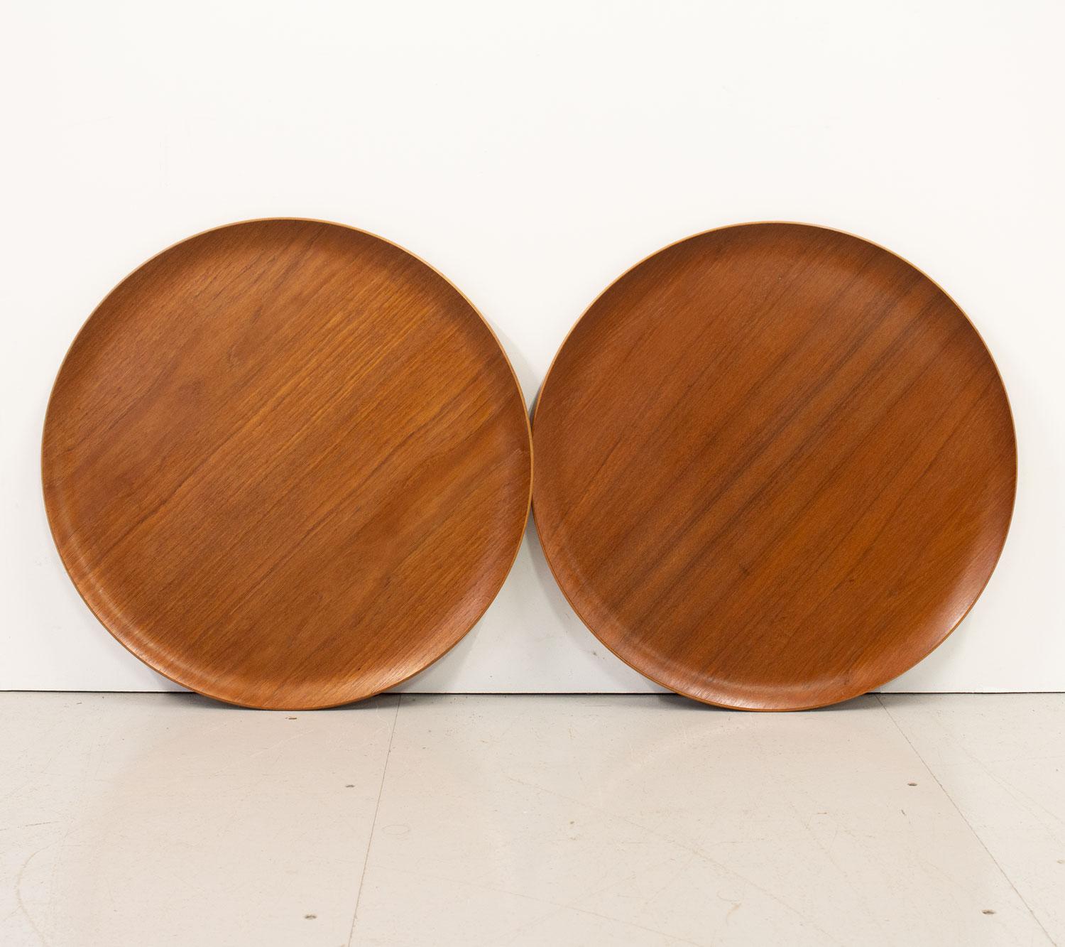 Pair of Danish teak model 4508 tray tables designed by H. Engholm & Svend Åge Willumsen. Originally created for the staff of Fritz Hansen in 1958 it was so popular that is was later put into production for sale to the public. The clever and