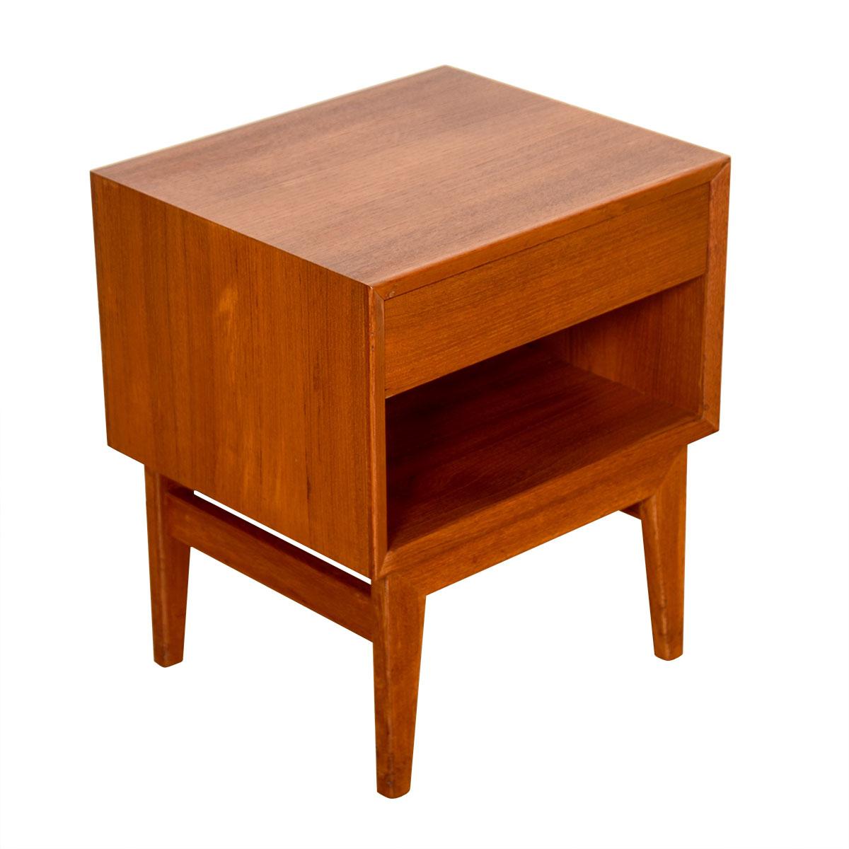 Pair of Danish Teak Nightstands End Tables with Finished Backsides

Additional Information:
Material: Teak
Featured at Kensington:
the search for the small nightstand is over!
Plenty of storage provided with the one drawer and cubby