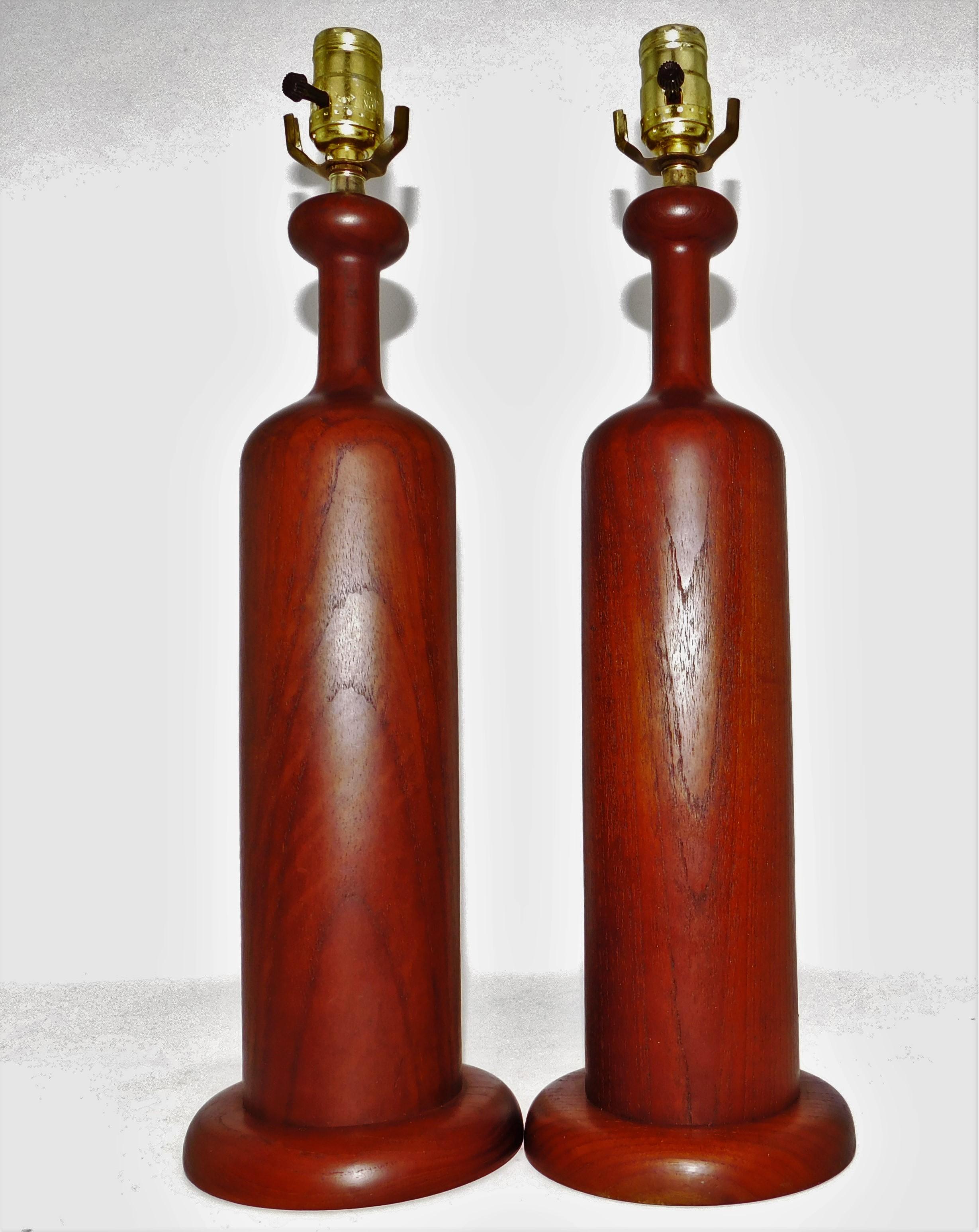 Fantastic set of sculptural Danish teak table lamps in solid staved-teak wood (ca. 1960s, Denmark). Vivid grain and rich color with in excellent, vintage condition with only minor wear present.
No shades included - listing is for the pair.
Height