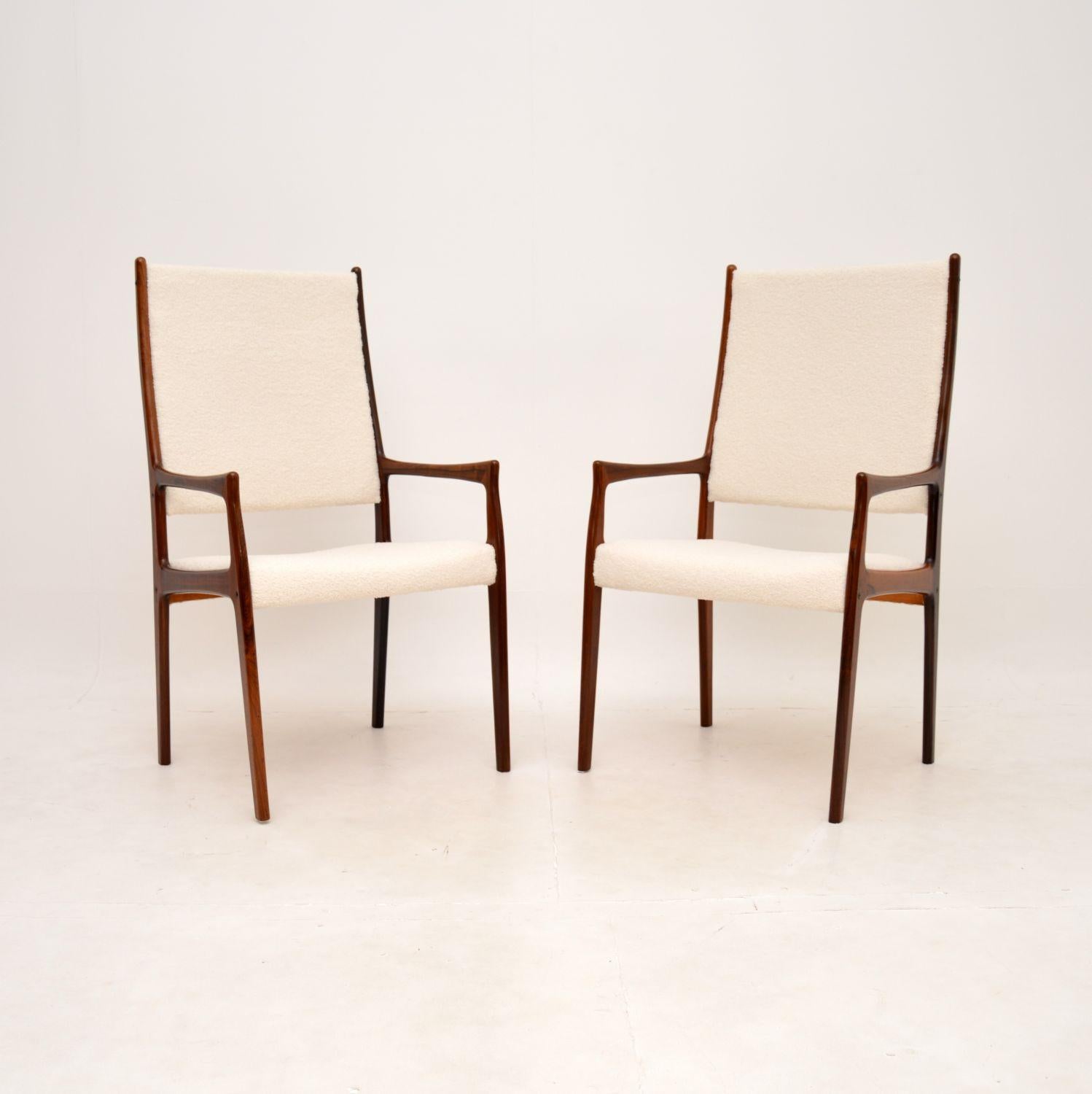 A stunning and very impressive pair of Danish vintage armchairs by Johannes Andersen. They were made in Denmark in the 1960’s.

The quality is outstanding, the frames have absolutely gorgeous grain patterns and colour tones. The frames have a