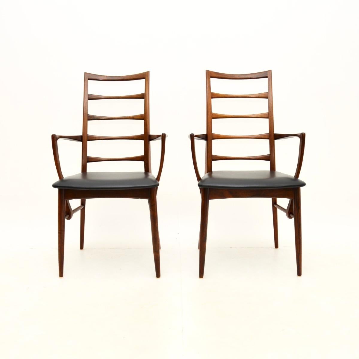 An extremely stylish and very rare pair of Danish vintage carver chairs by Niels Koefoed. They were made in Denmark by Koefoed Hornslet in the 1960’s, this model is called the ‘Lis’ chair.

The quality is outstanding, with sculptural and elegant