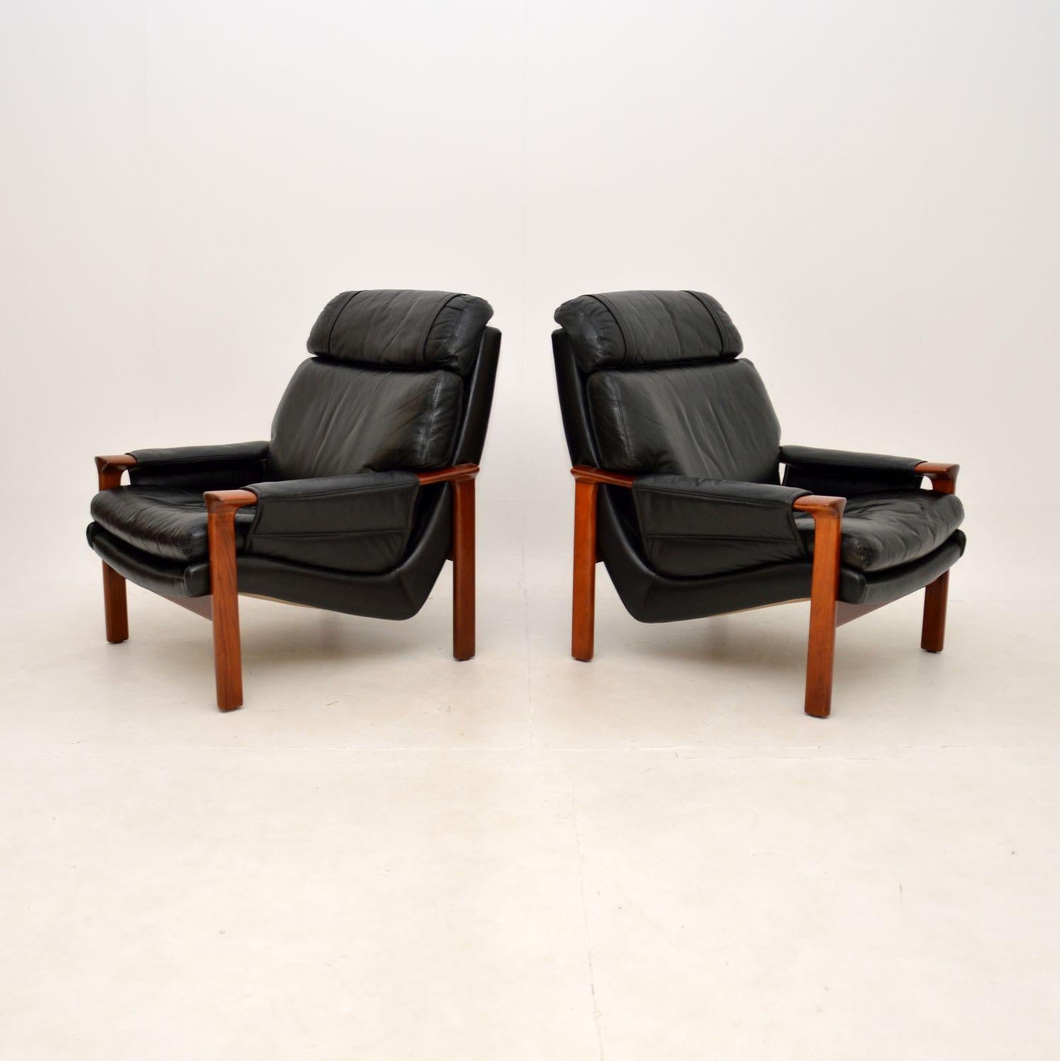 A stylish and extremely comfortable pair of Danish vintage leather armchairs, dating from around the 1960-70’s.

They are of superb quality, very well made, generous and unbelievably comfortable to relax in. The frames have a lovely design and