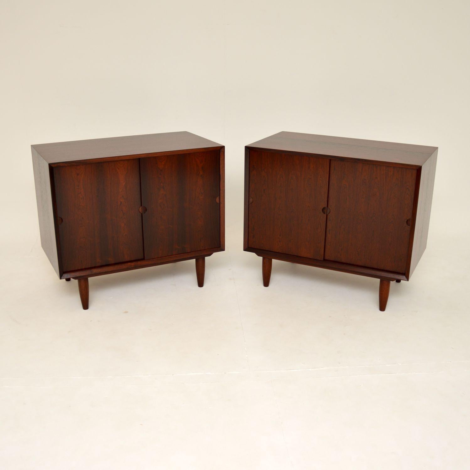 A stunning pair of vintage Danish cabinets. These were made in Denmark in the 1960’s, they were designed by Poul Cadovius.

They are of absolutely amazing quality, with a gorgeous colour tone and beautiful grain patterns throughout. Even the