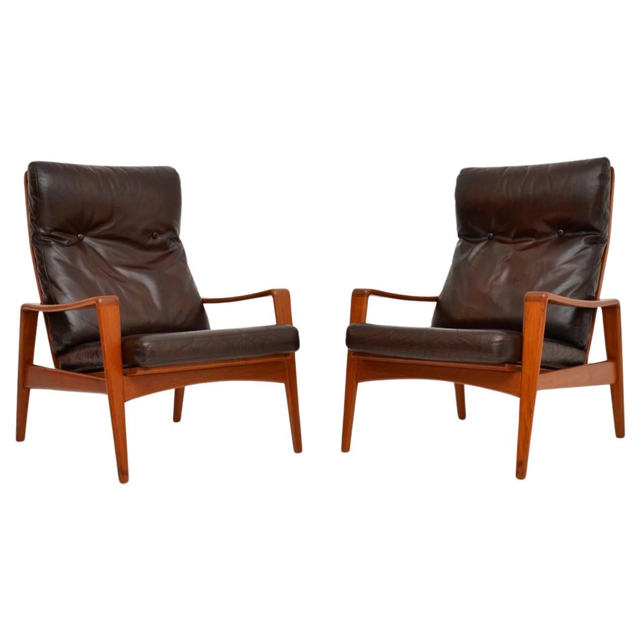Paire de fauteuils danois vintage en teck et cuir par Arne Wahl Iversen en vente