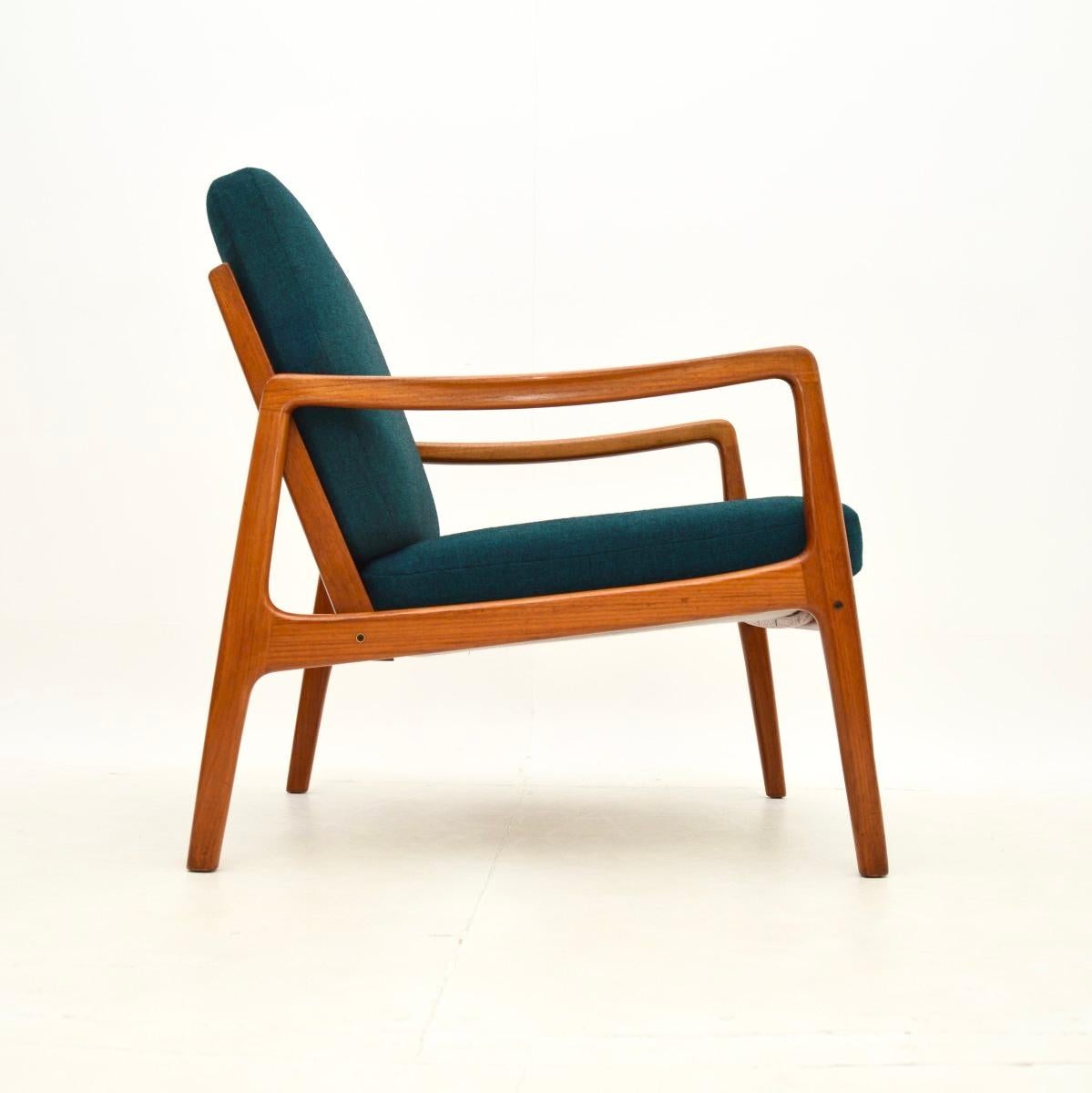 Pareja de sillones daneses vintage de teca de Ole Wanscher mediados del siglo XX en venta