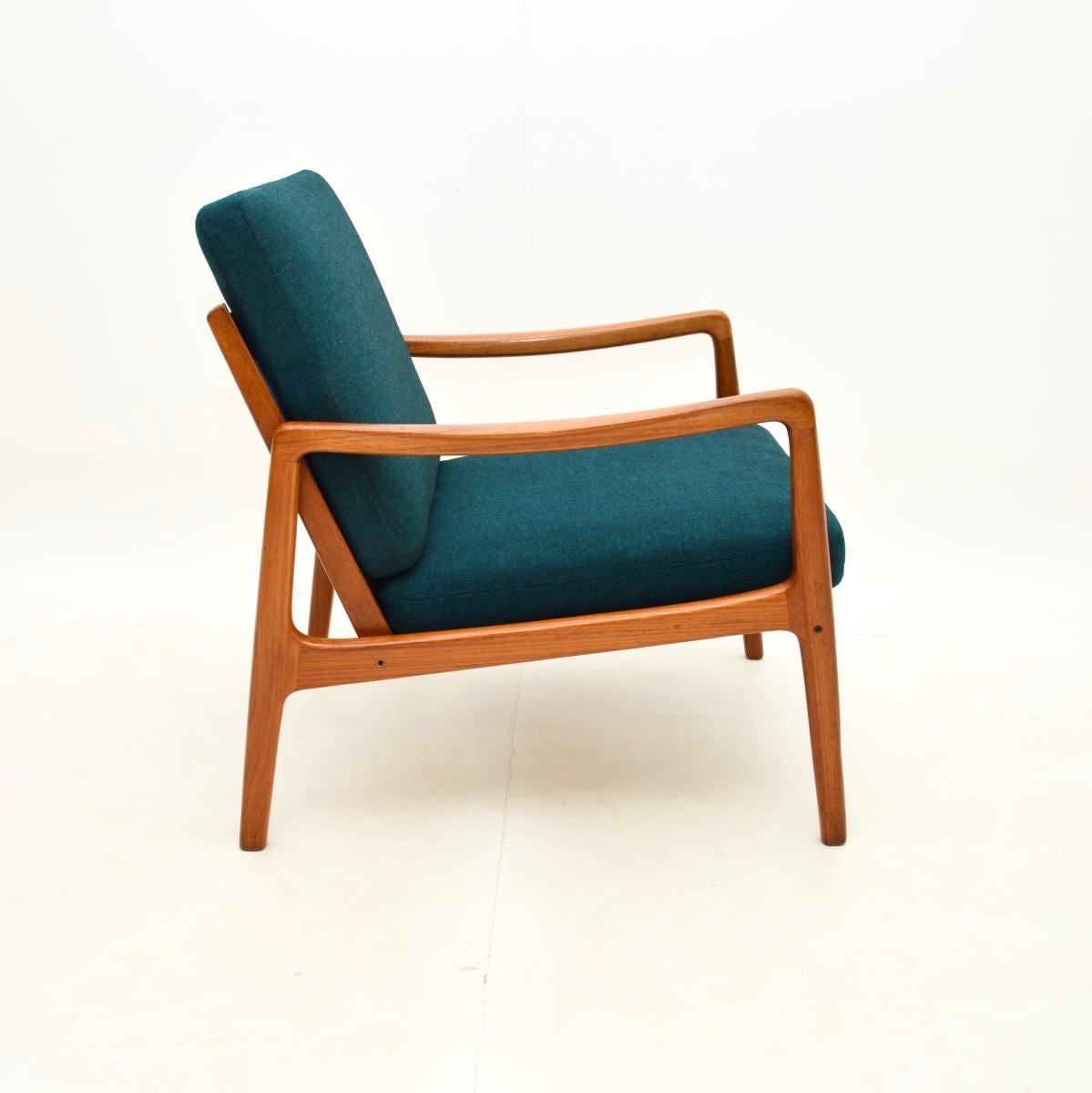 Pareja de sillones daneses vintage de teca de Ole Wanscher Tela en venta