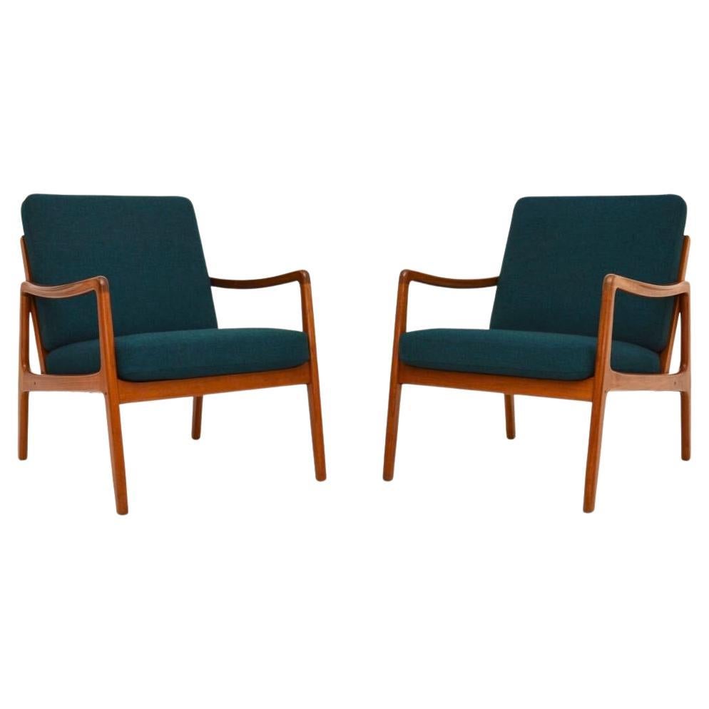 Coppia di poltrone danesi in teak vintage di Ole Wanscher