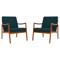Pareja de sillones daneses vintage de teca de Ole Wanscher