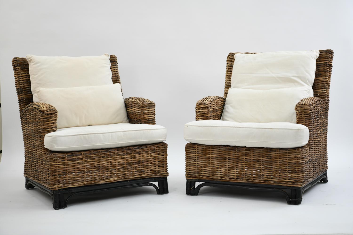 This fabulous pair of Danish wicker easy chairs were previously sold by Jytte Demuth, a well respected Danish interior design firm. These chairs have a refreshing, fun appearance and could be used in interior or exterior spaces.