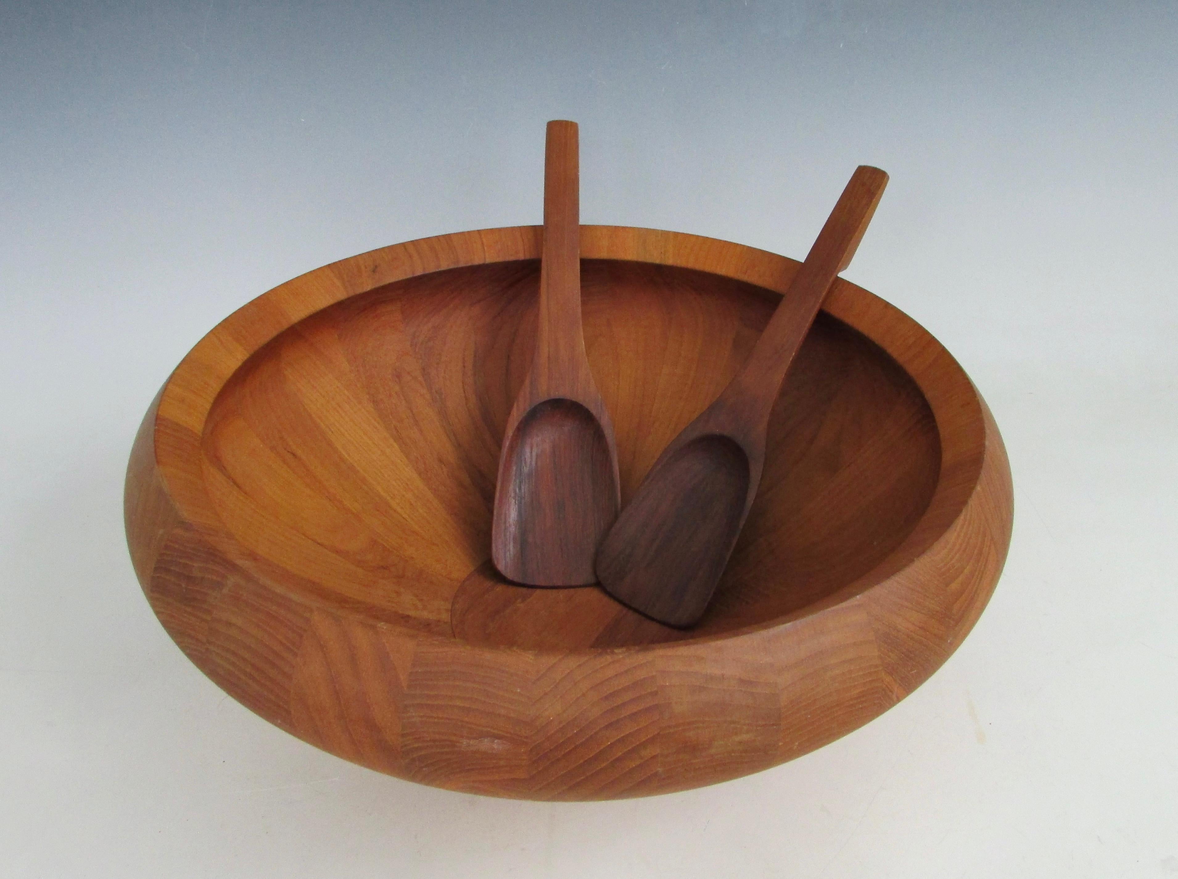 Fine pair of solid teak salad servers with large Dansk  teak bowl . Designed by Jens Harold Quistgaard  (JHQ ) for Dansk . Servers Stamped JHQ Denmark . Bowl marked Dansk Designs Denmar JHQ . Very Good condition through out . 