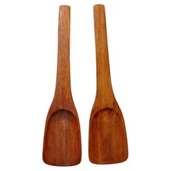 Pair of Dansk solid teak salad servers marked JHQ Denmark