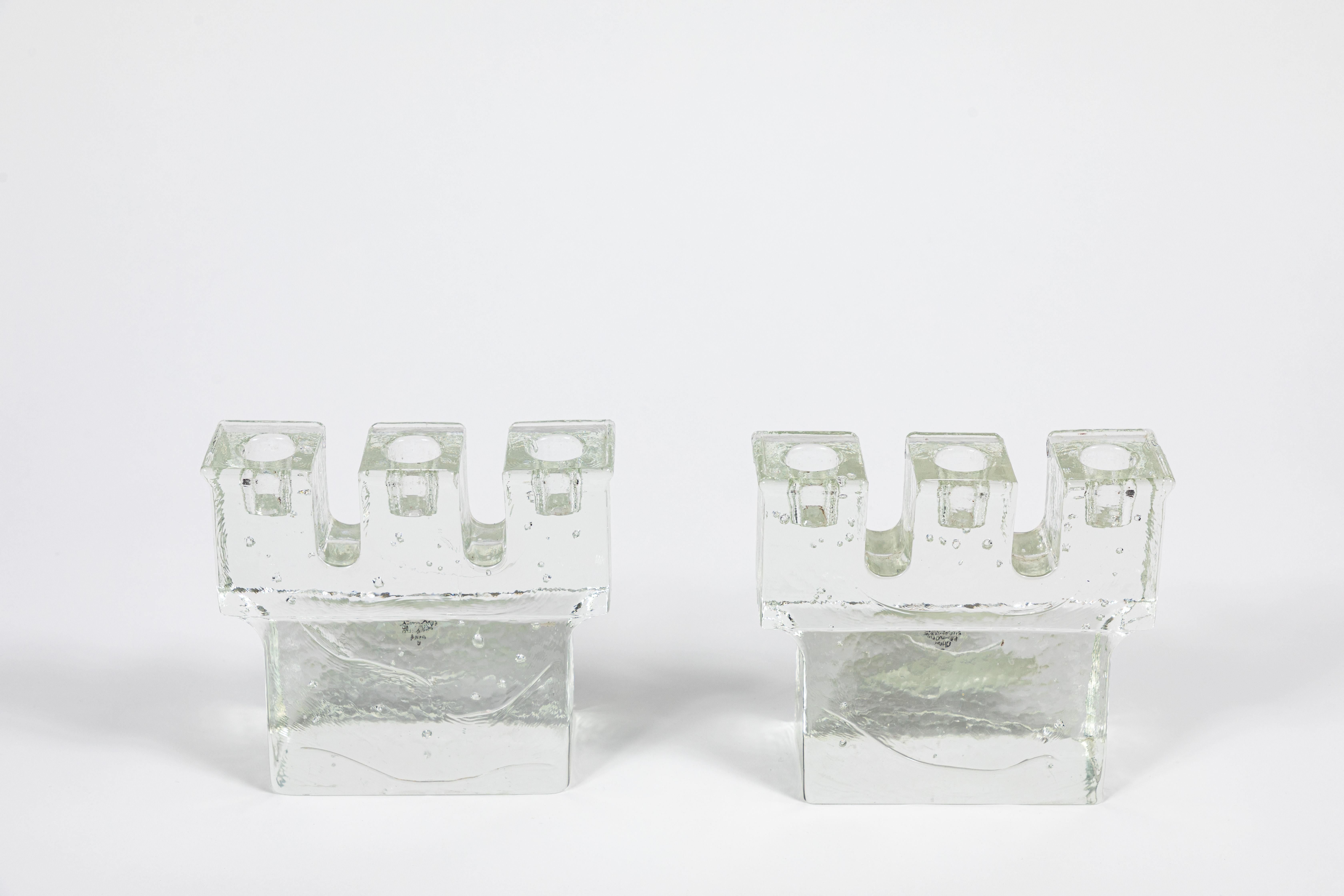 Pair of Dansk vintage ice cube 3-arm candleholders with heavy glass construction.