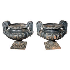 Pair of Dark Green/Black Painted Cast Iron Urns