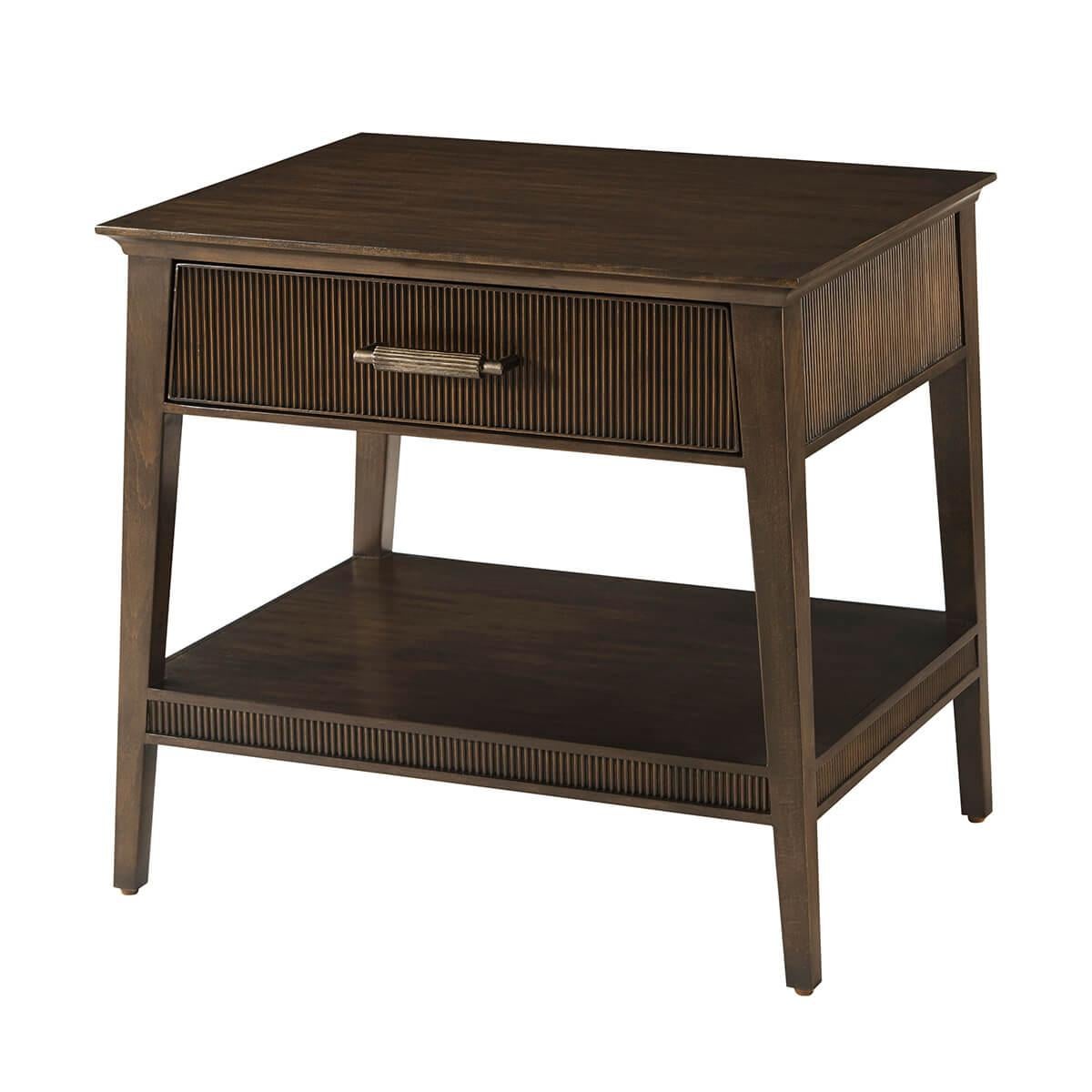 Crafted from Prima Vera in our Bistre finish, features a sophisticated tapered silhouette and reeded drawer and shelf. The custom forged hardware, finished in a dark rubbed bronze, echoes the reeded details throughout.

Dimensions: 24