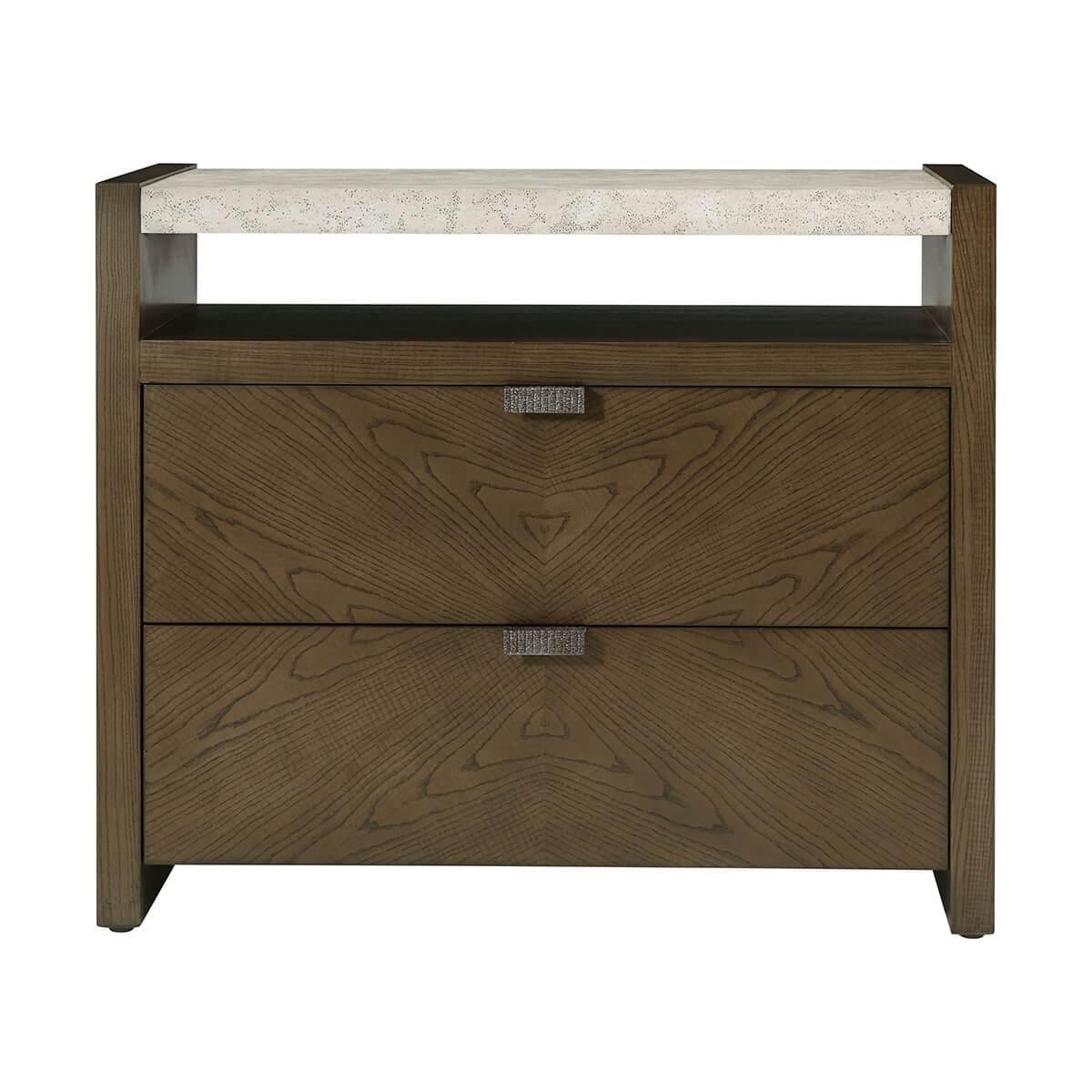a handsome bedside nightstand in figured cathedral ash in a dark Earth finish with metal pulls in our Ember finish and soft close drawers.

The top of this nightstand is done in our exclusive Mineral finish. It is perfect for storing your bedroom
