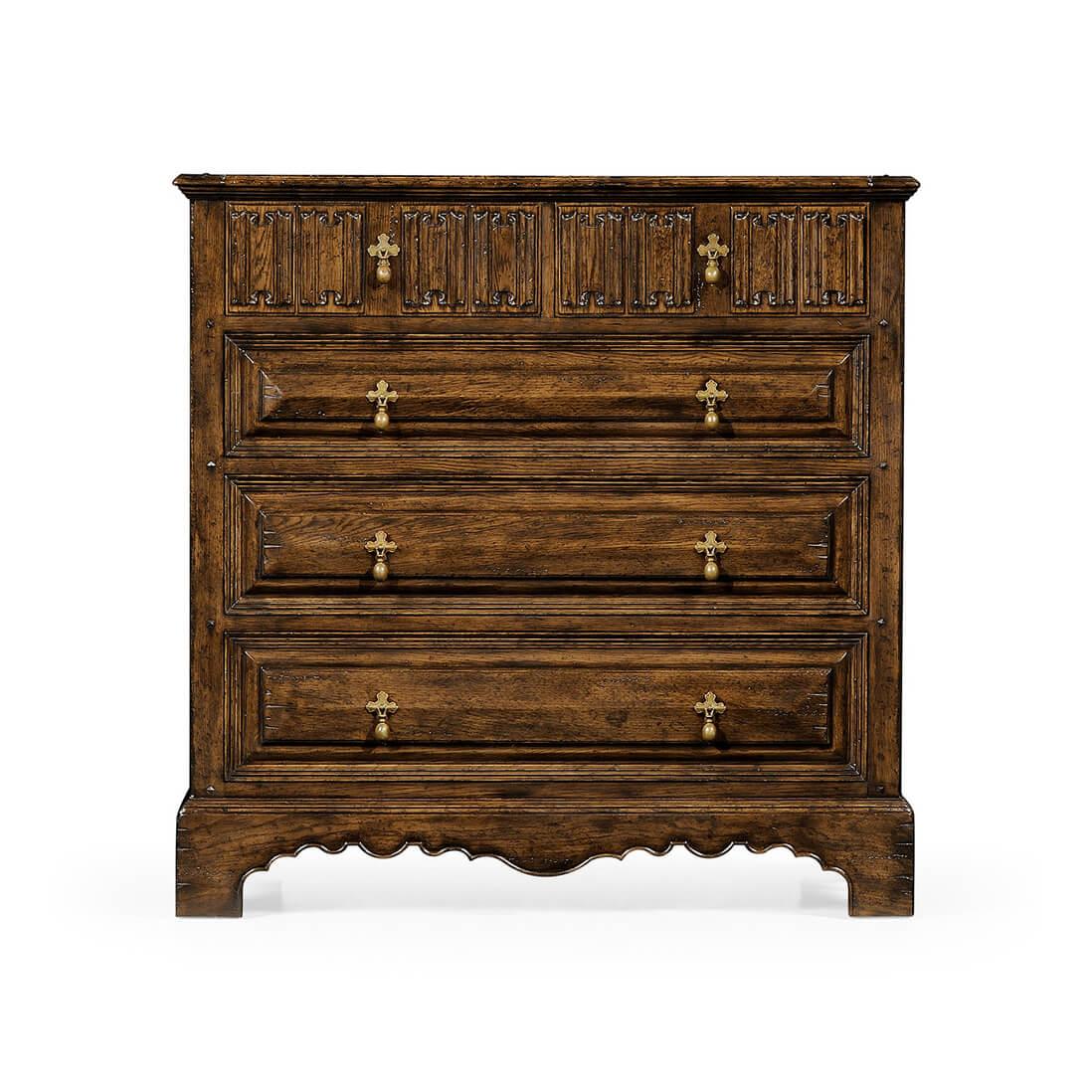 Pair of Dark brown oak heavily distressed chest of drawers with linenfold carved detail to the two top drawer fronts and stepped molding to the three graduated drawers. Patinated brass drop handles, the whole set on a shaped raised block foot