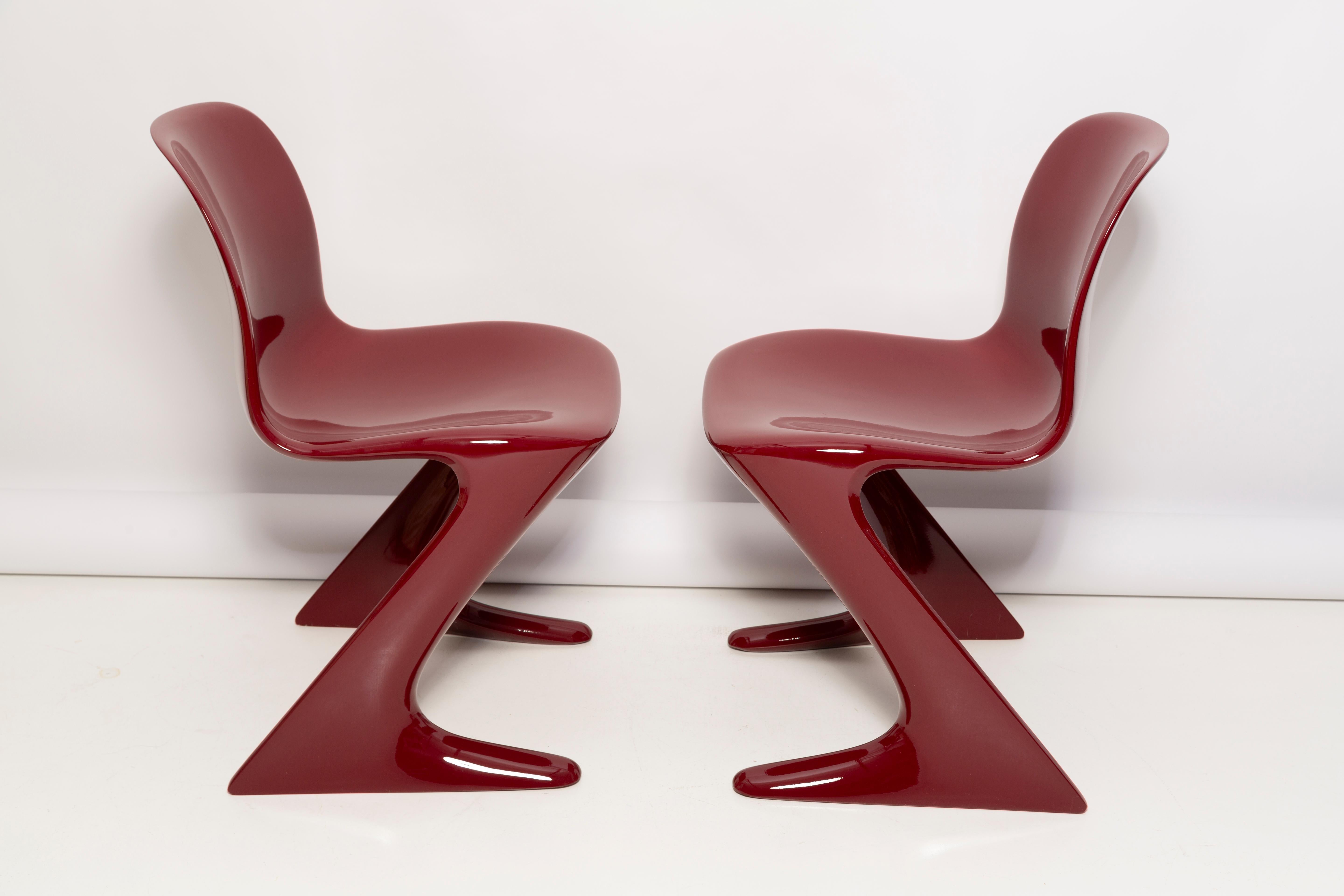 Mid-Century Modern Pair of Dark Red Wine Kangaroo Chairs Designed by Ernst Moeckl, Germany, 1968 For Sale
