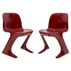 Vintage Pair of Dark Red Wine Kangaroo Chairs Designed by Ernst Moeckl, Germany, 1968