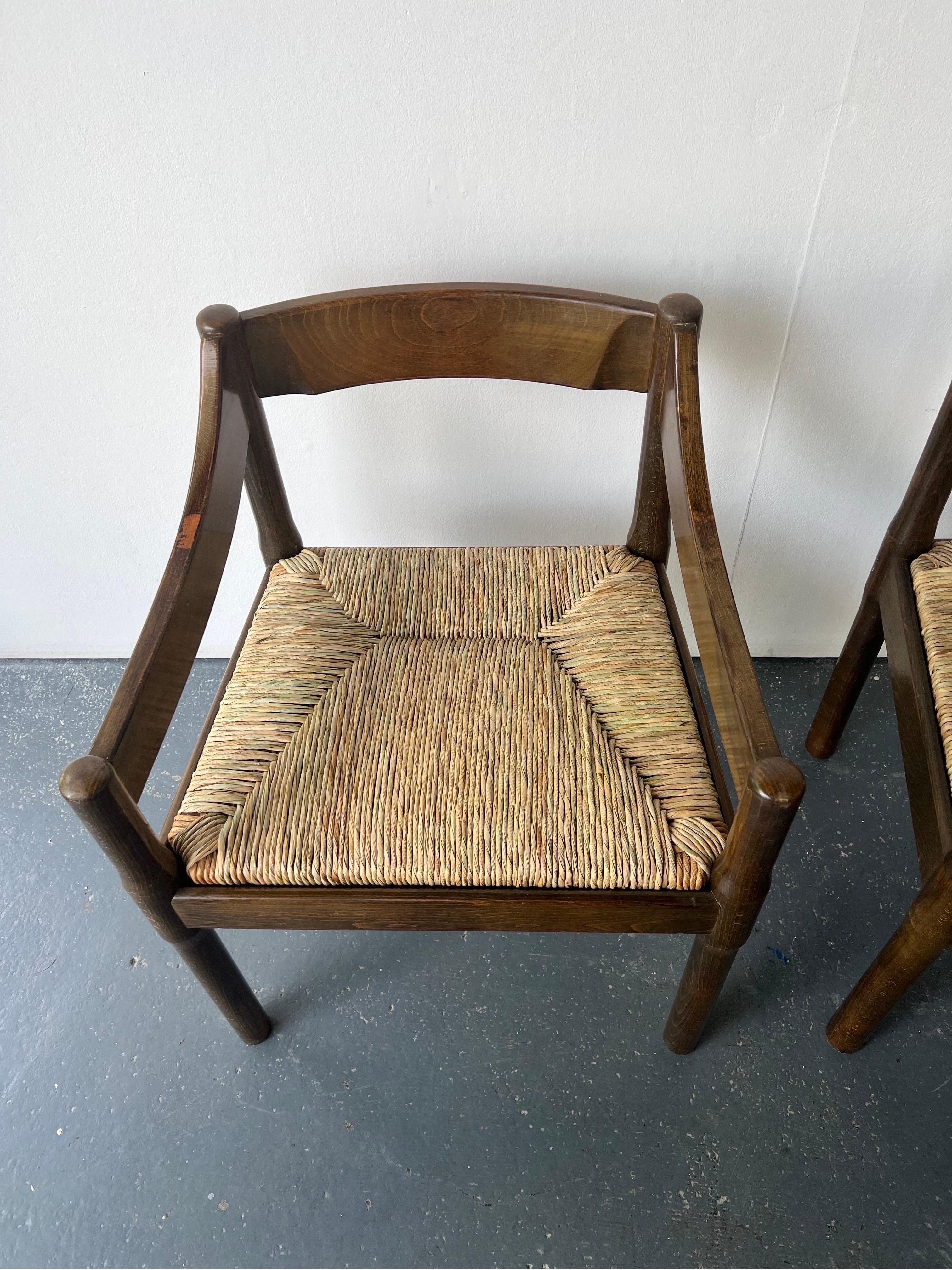 Pair of Dark Wood Carimate Carver Chairs by Vico Magistretti In Good Condition In London, GB