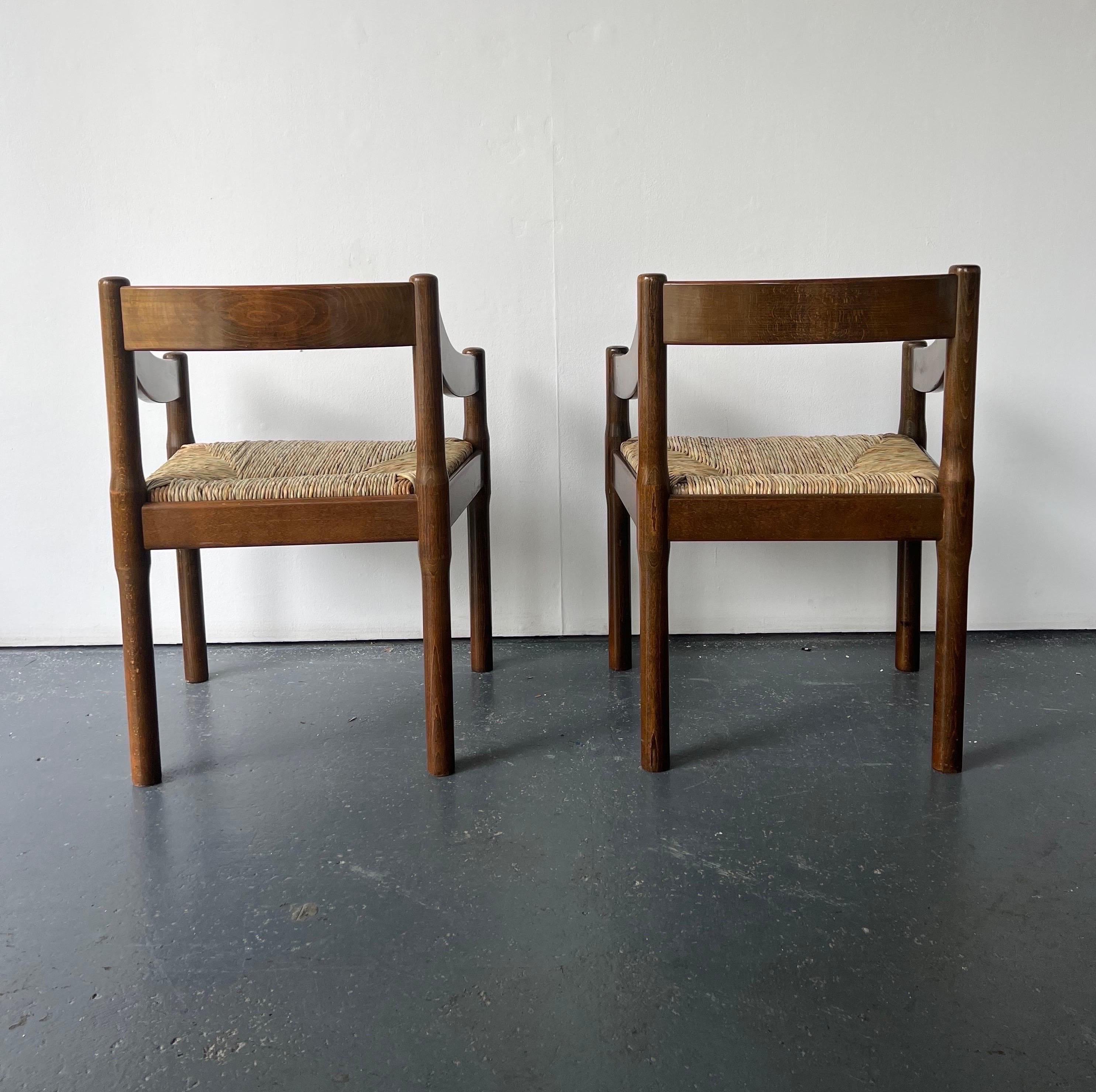 Beech Pair of Dark Wood Carimate Carver Chairs by Vico Magistretti