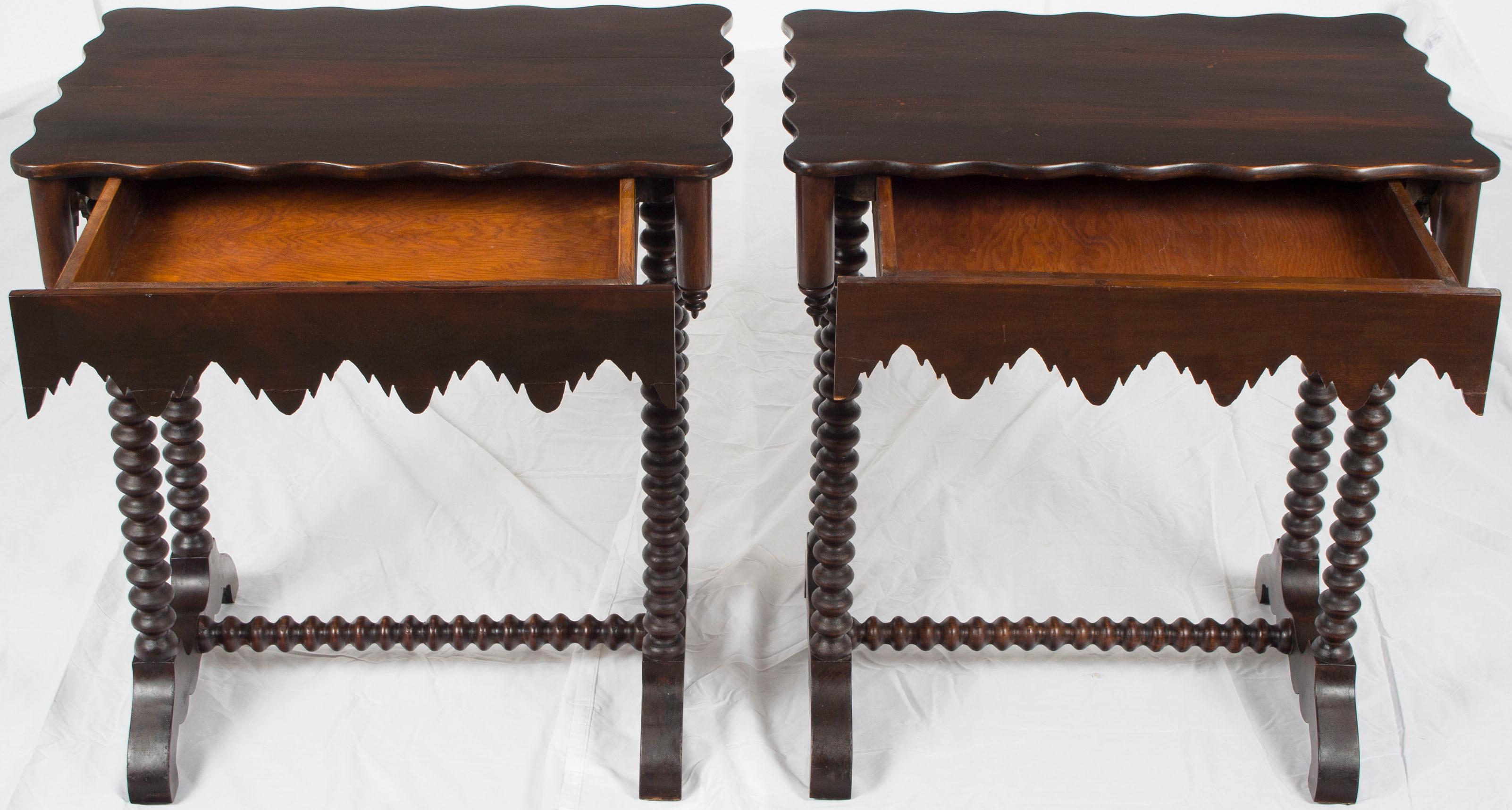 In truly Gothic style, this pair of mahogany end tables make a real statement! Shaped tops, twist turned legs, and uniquely shaped arched aprons really give credence to the style. Rounded corners with upside down finials finish the look off nicely.