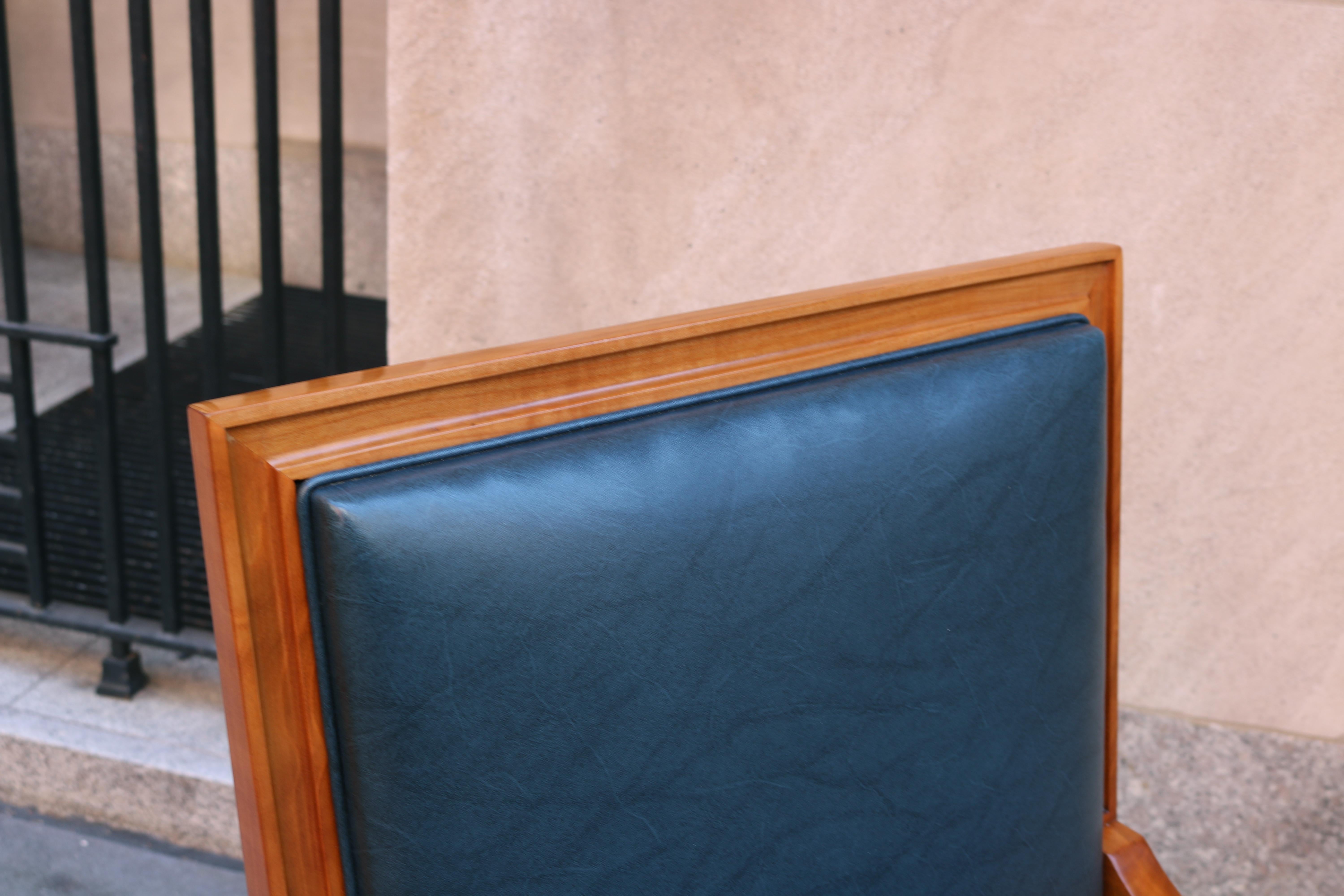 Pair of large De Coene Frères Art Deco Armchairs.

Cherrywood with bronze details and sabots.