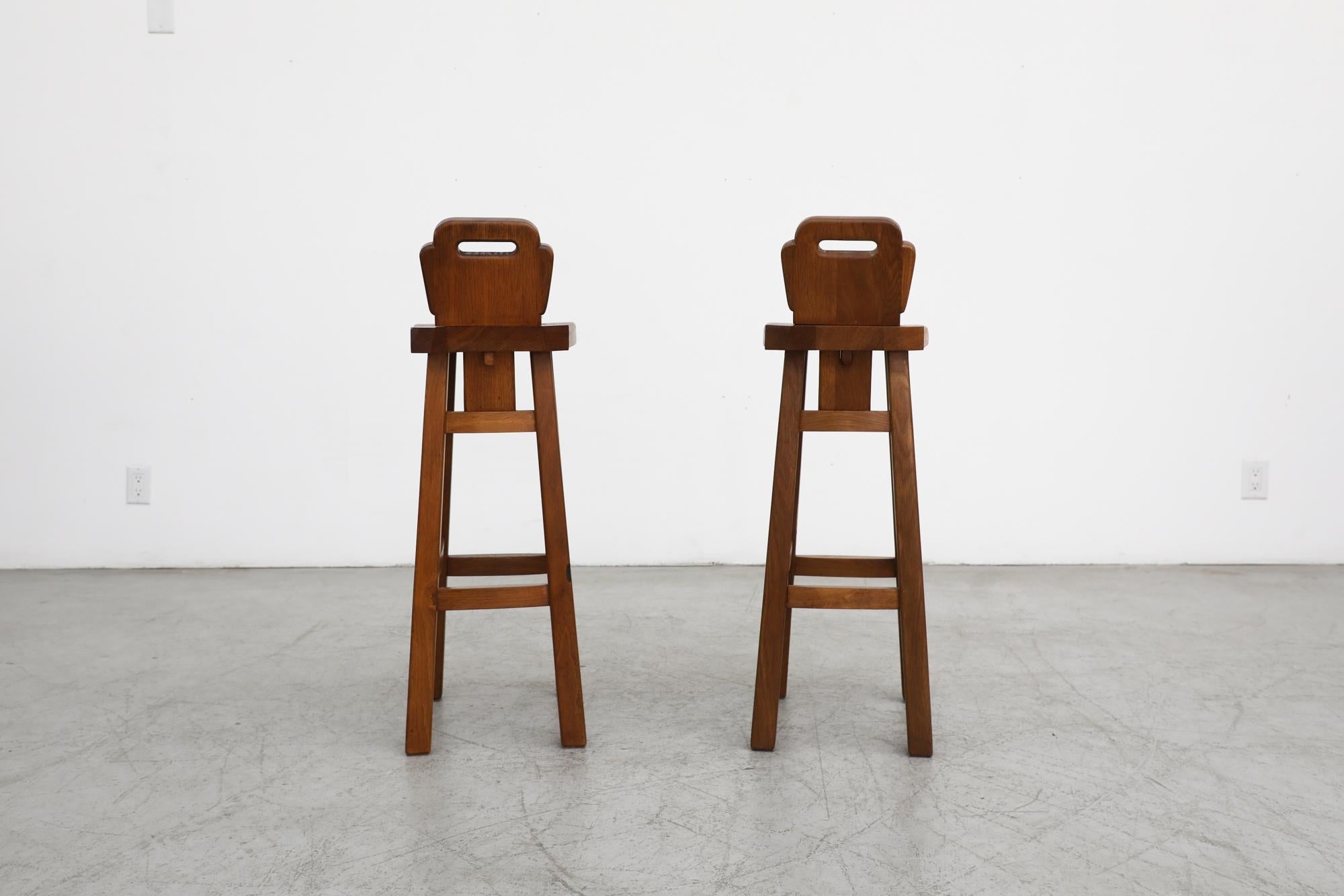 Mid-20th Century Pair of De Puydt Attributed Solid Oak Brutalist Bar Height Stools