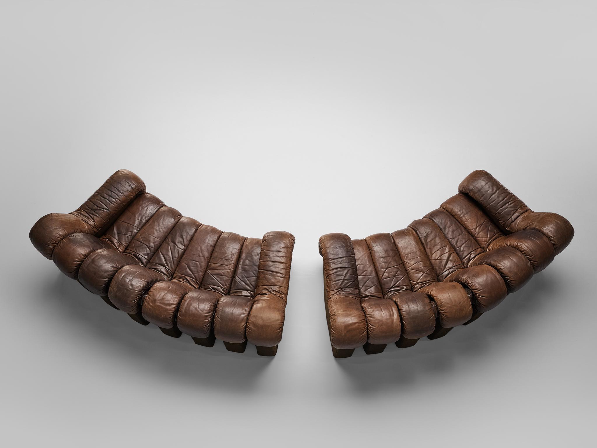 Pair of De Sede ‘Snake’ DS-600 sofas, brown leather, Switzerland, 1972.

A pair of two De Sede 'Snake' sofas in smooth brown leather. A design by Ueli Bergere, Elenora Peduzzi-Riva, Heinz Ulrich and Klaus Vogt at De Sede, Switzerland. De Sede 'Non