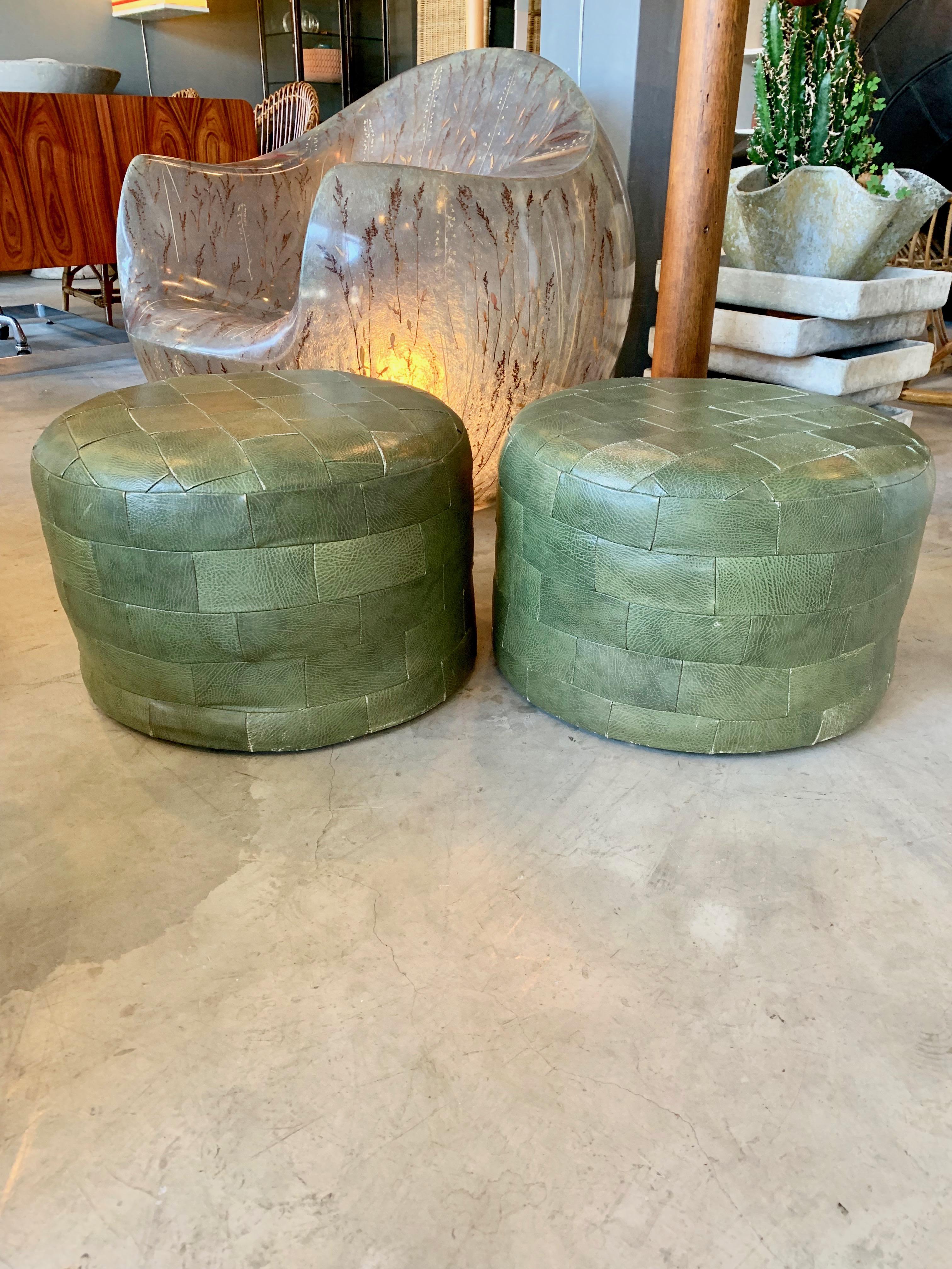 Gorgeous pair of patchwork olive leather ottomans by De Sede. Great coloring and patina to leather. Very good condition.

Priced as a pair. 

   