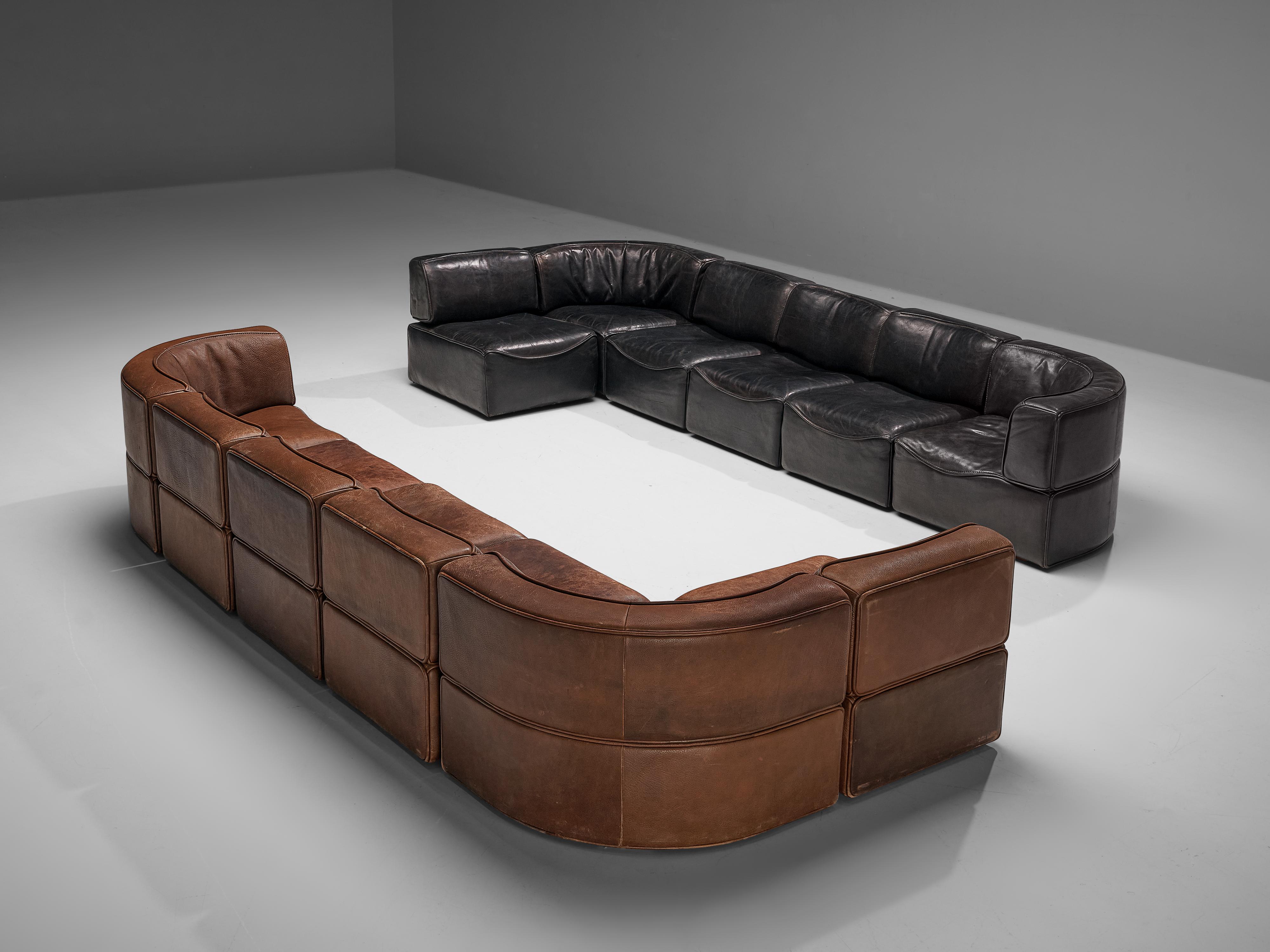 De Sede, pair of sectional sofas model DS-15, leather, Switzerland, 1970s.

These high quality sectional sofas designed by DeSede in the 1970s contain both one corner element and four normal elements, which makes it possible to arrange these sofas