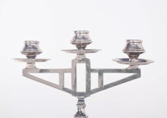 Paire de chandeliers déco en métal argenté