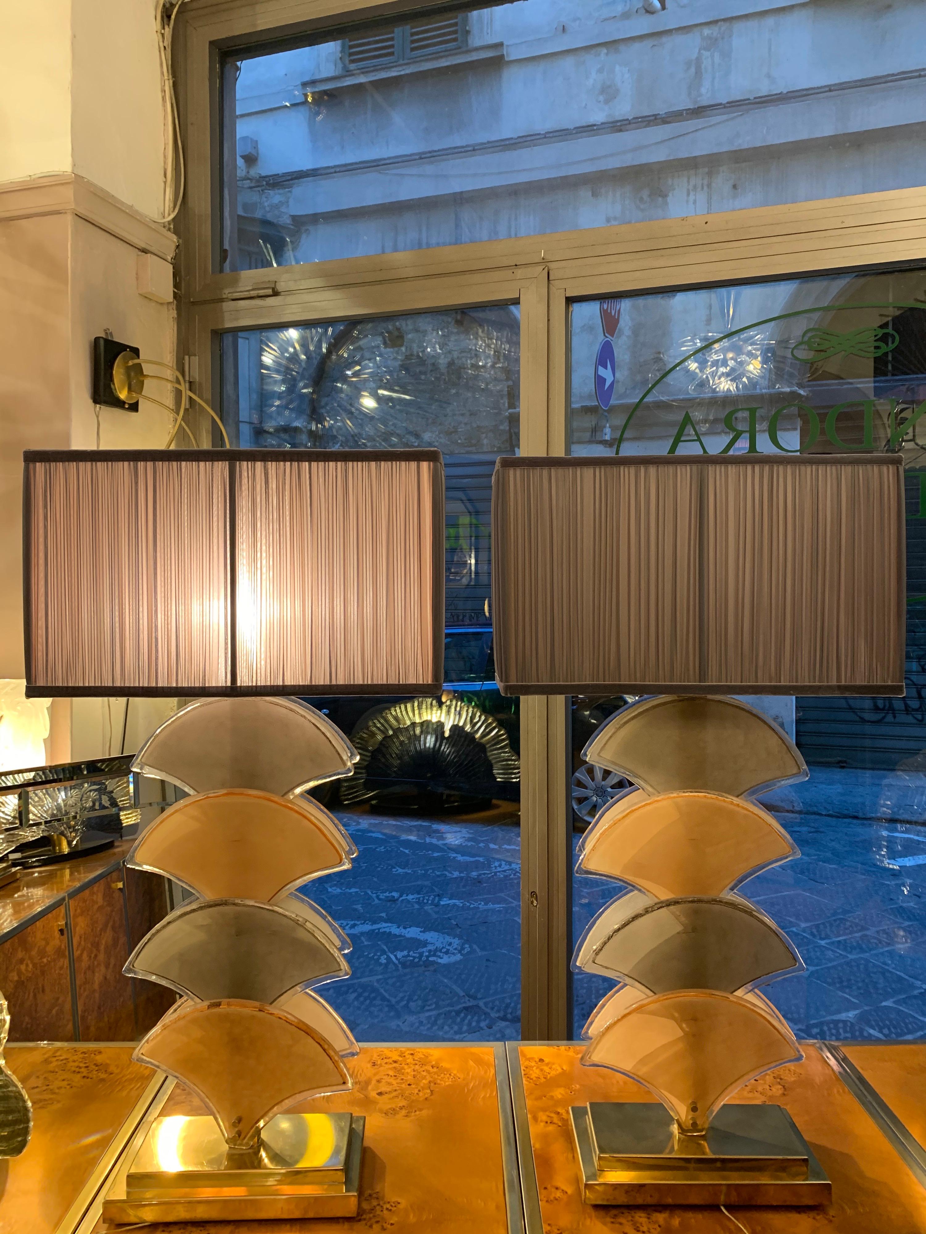 Pair of Art Deco fan-shaped cream and grey Murano glass table lamps, rectangular brass base.

The lampshades are handsewn by us with ruched chiffon double color (grey outside and rose pale inside). There are pictures also with lampshades with grey