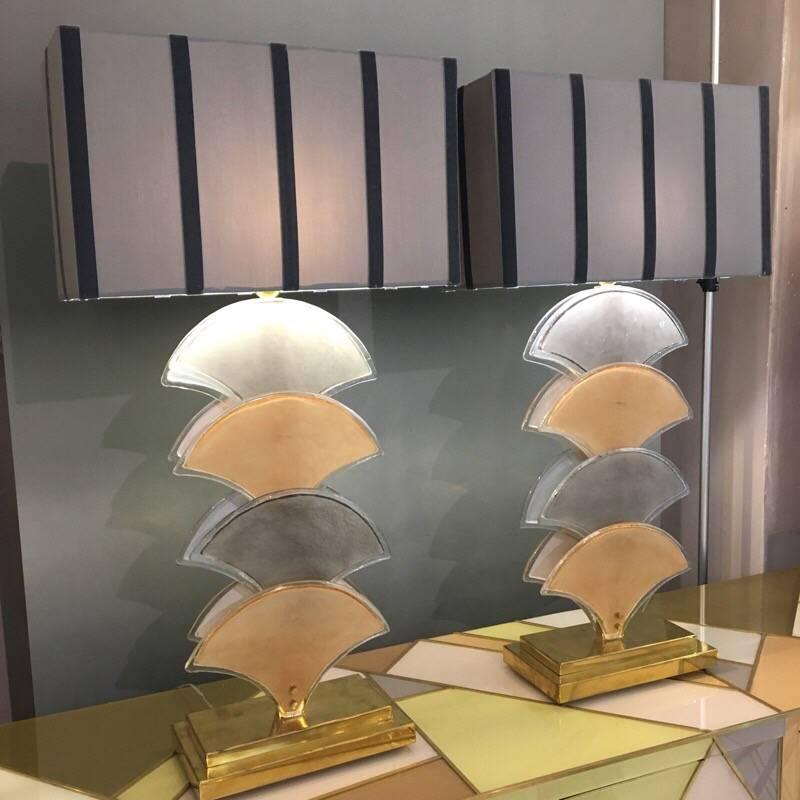 Pair of Art Deco fan-shaped cream and grey Murano glass table lamps, rectangular brass base.

The lampshades are handcrafted by us with grey fabric, the stripes are in grey velvet.

The professional rewiring of the sconces, based on your country