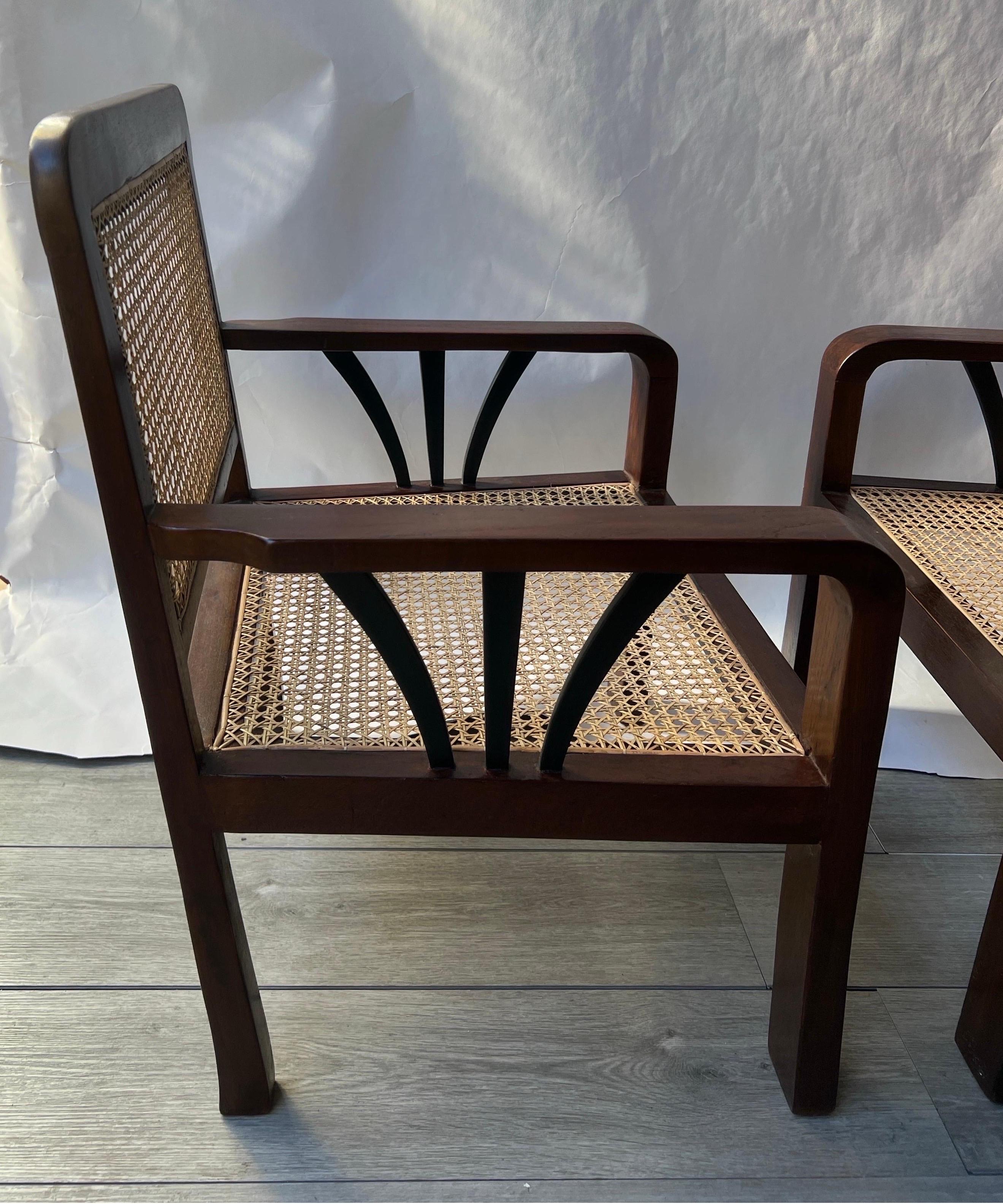 20th Century Pair of Deco Period British Colonial Hand Caned Teak Club Chairs  For Sale