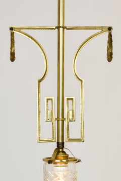 Pair of Decorated Art Deco Cast Brass Pendant Lamps with Cut Crystal Shade