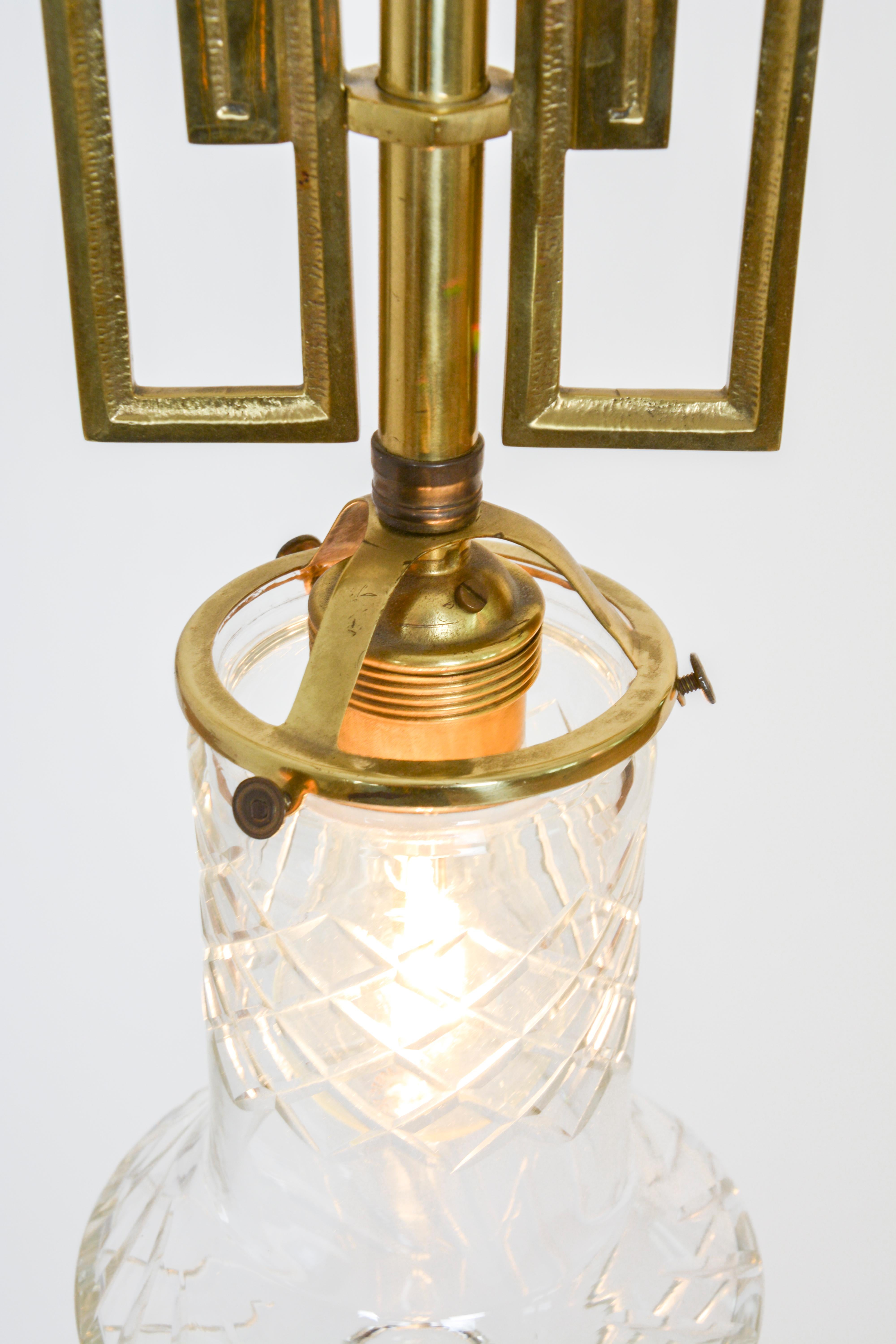 20th Century Pair of Decorated Art Deco Cast Brass Pendant Lamps with Cut Crystal Shade For Sale