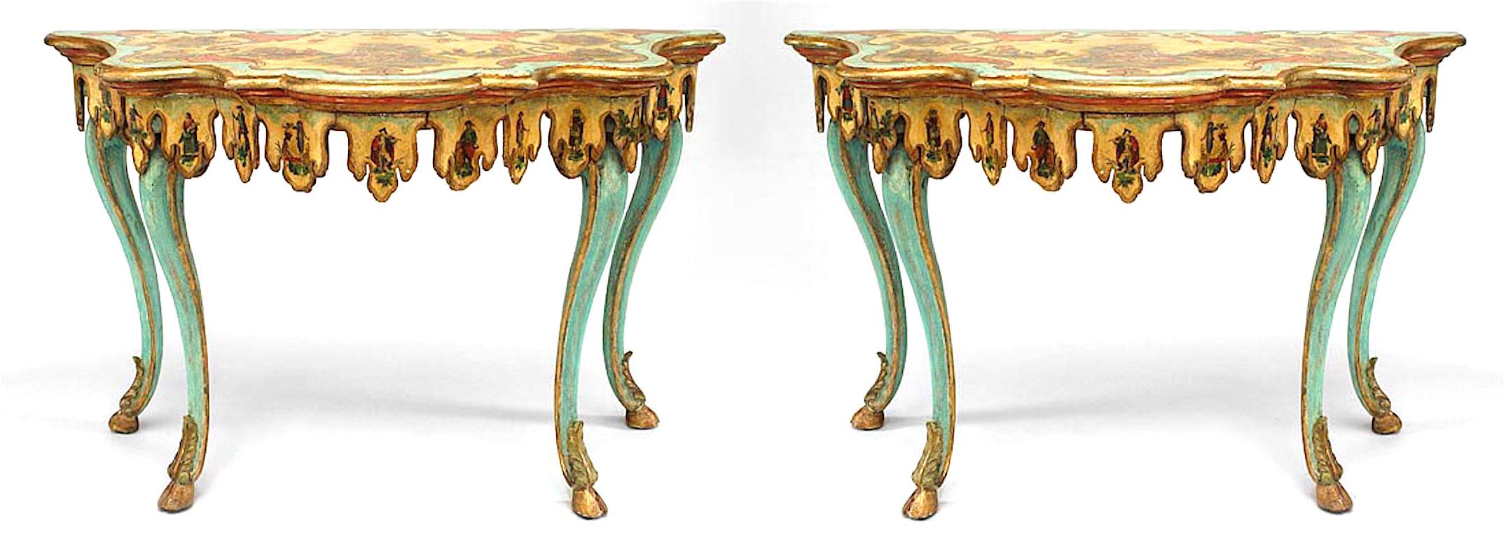 Pair of Venetian console tables dating to the turn of the nineteenth century. These wooden tables are green, red, yellow, and gilt painted and feature lacca povera decoration on their serpentine tops and scalloped apron. Each table rests upon four