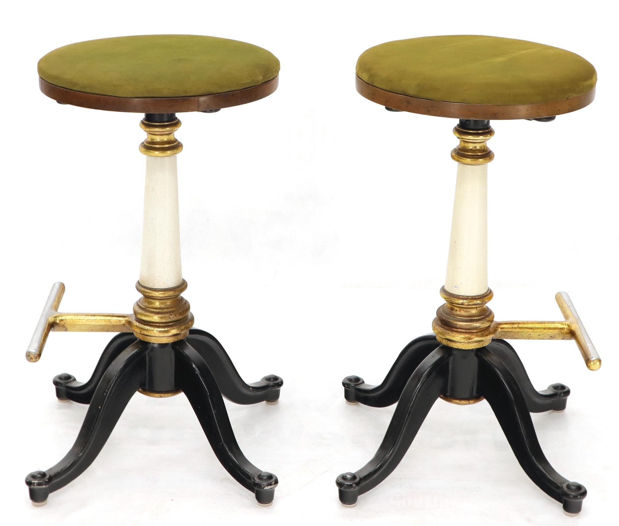 Pair of decorative vintage Mid-Century Modern bar stools on 4 cast iron legs base.
