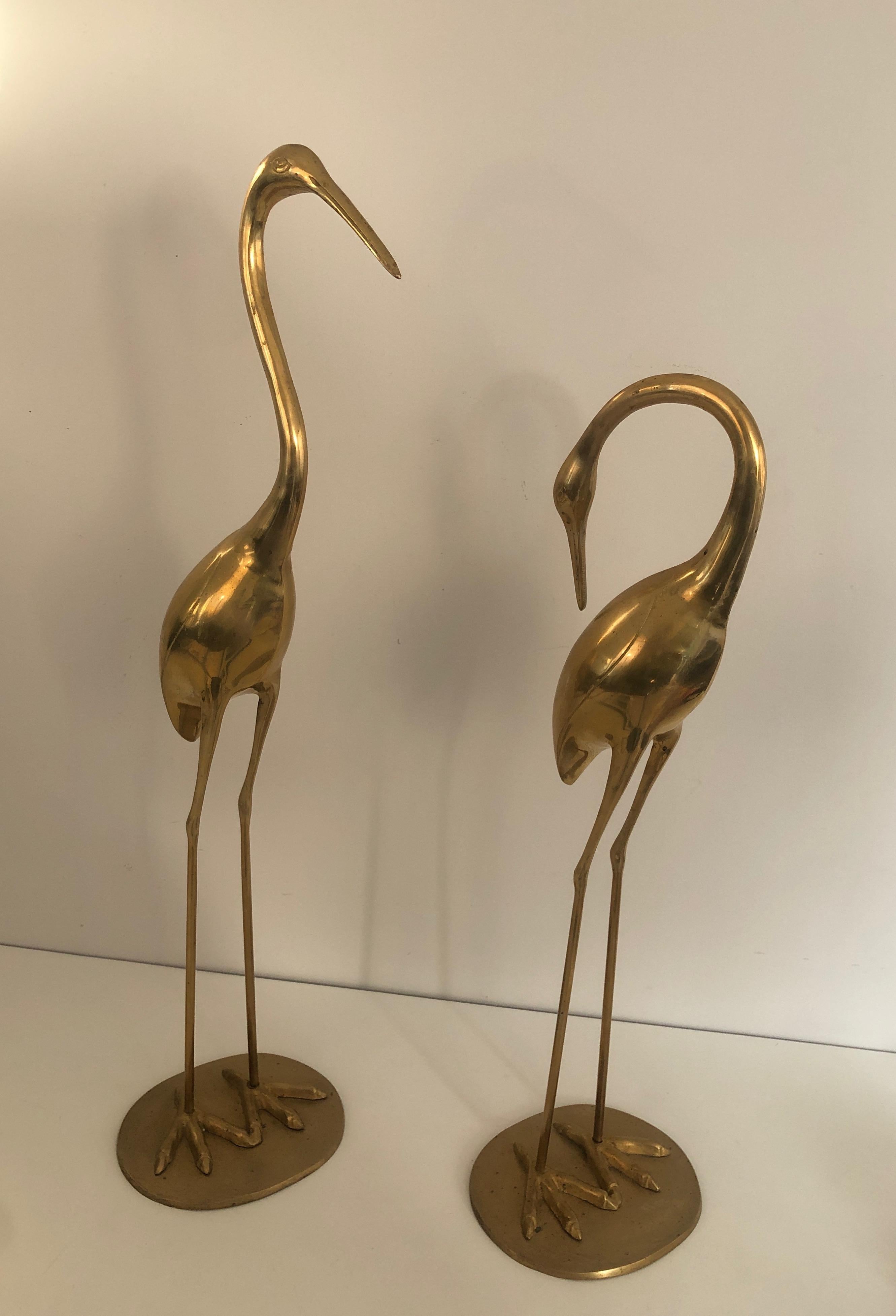 This pair of decorative Herons are made of brass. This is a French work, circa 1970.
