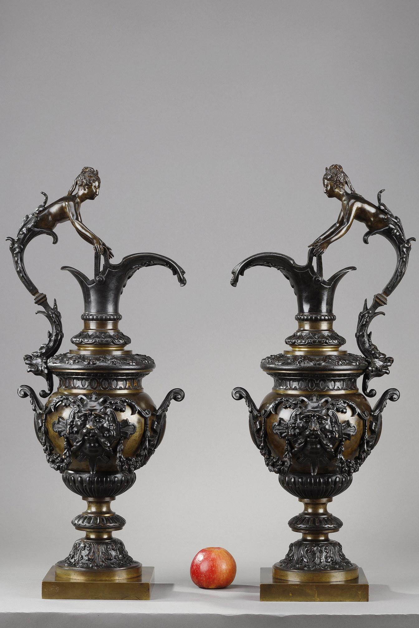 Patinated Pair of Decorative Bronze Ewers in the Renaissance Style For Sale