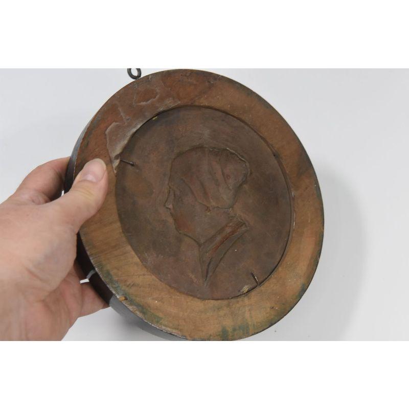 Earthenware Pair of Decorative Bronze Medallions For Sale