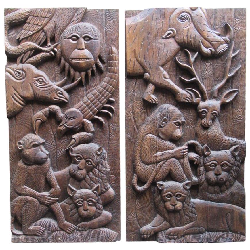 Pair of Decorative Carved Teak Wood Panels with Monkeys and Other Wild Animals