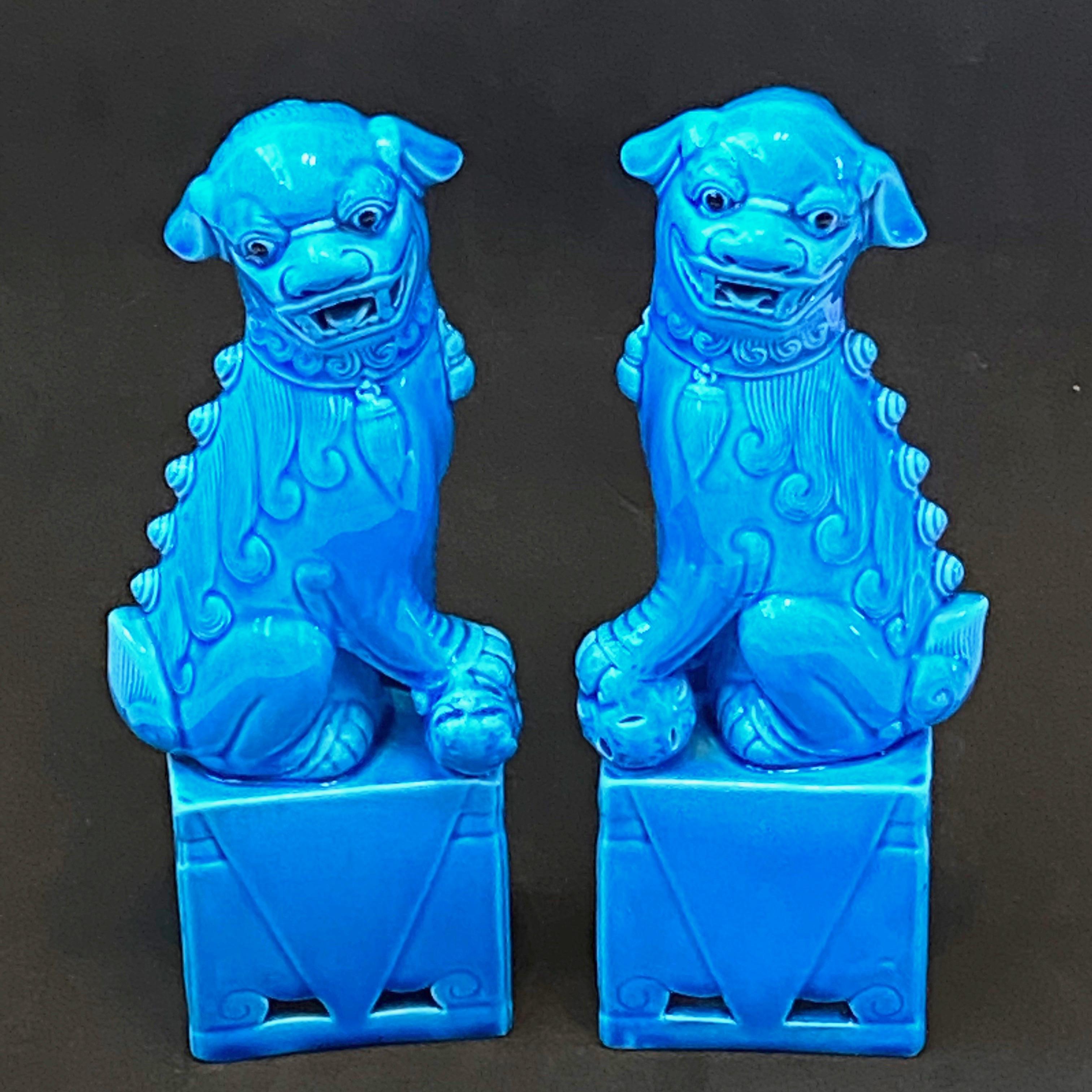 A very nice pair of vintage, medium size, turquoise blue, ceramic foo dogs, circa 1960s. Excellent condition and patina; makes a fun decor item in any room!