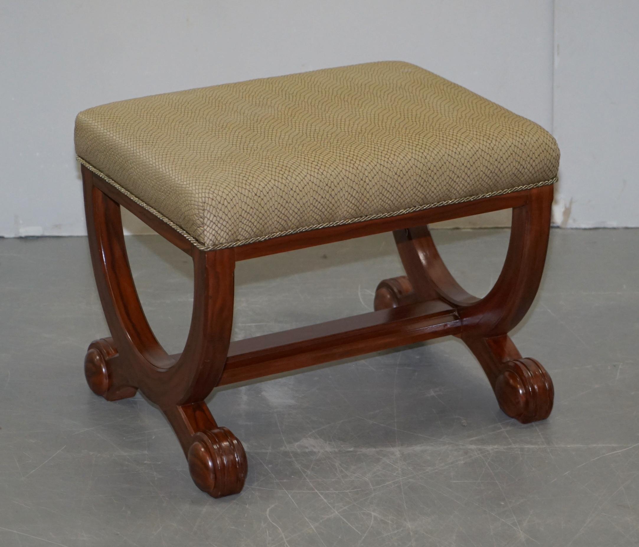 We are delighted to offer for sale this pair of regency style large footstools or bench seats with lovely curved frames

These are nicely made modern stools designed to look 200+ years old. They have faux mahogany painted frames which have a