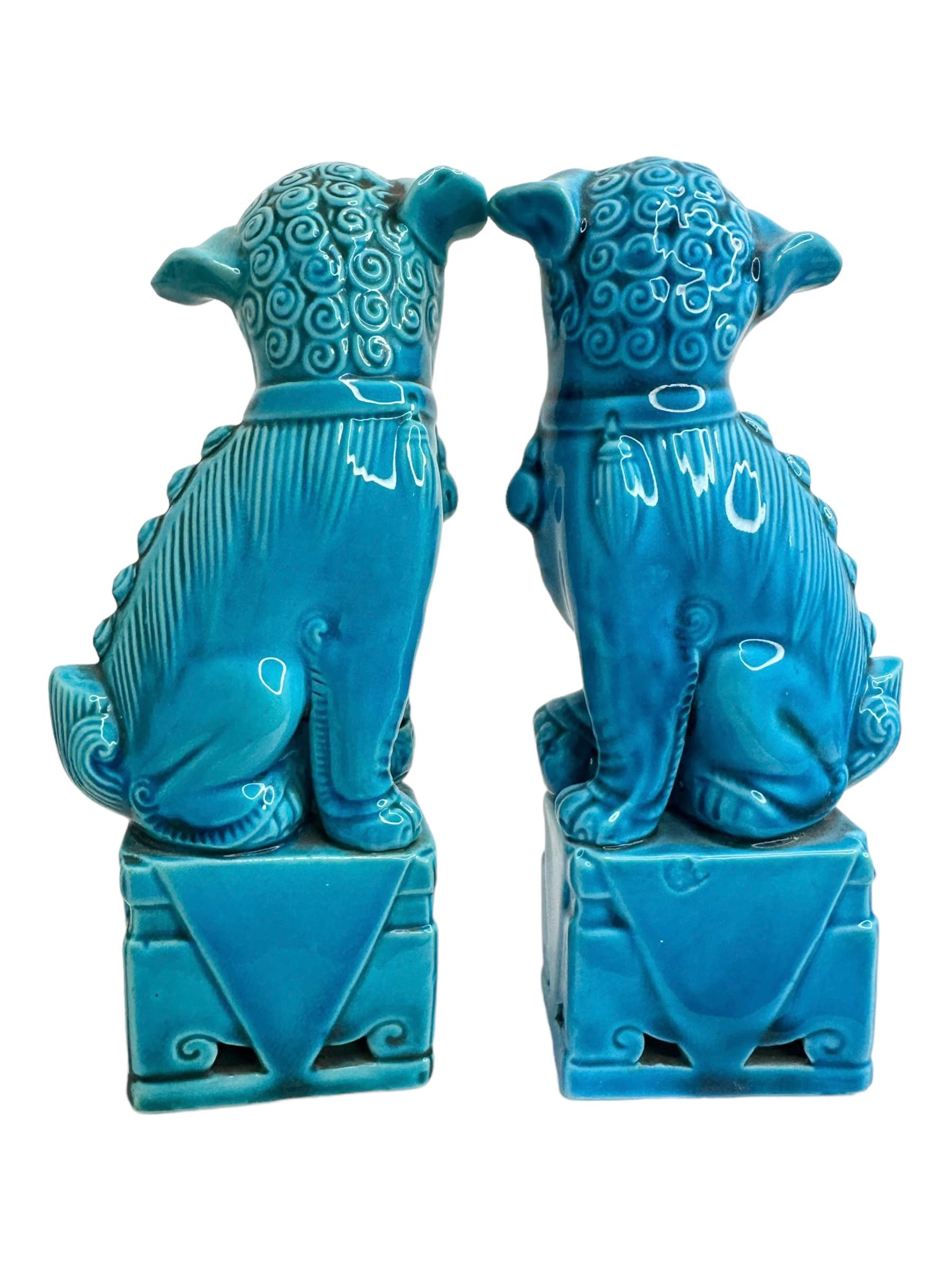 A very nice pair of vintage, turquoise blue, ceramic foo dogs, circa 1980s. Excellent condition and patina; makes a fun decor item in any room! Found at an estate sale in Vienna, Austria.
