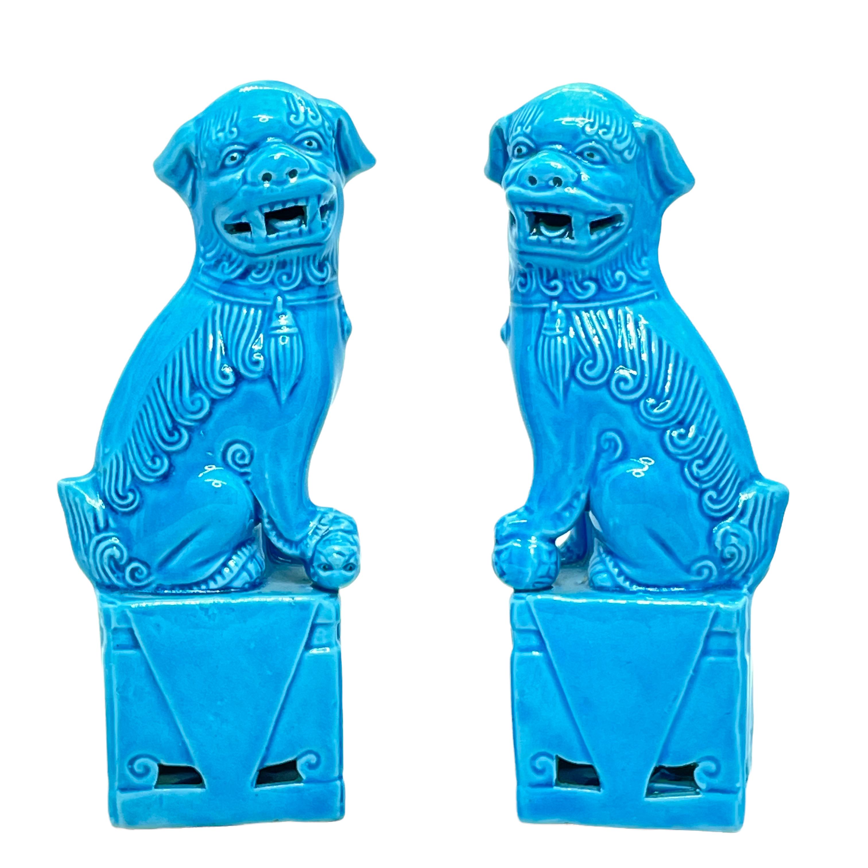 A very nice pair of vintage, mini, turquoise blue, ceramic foo dogs, circa 1980s. Excellent condition and patina; makes a fun decor item in any room!