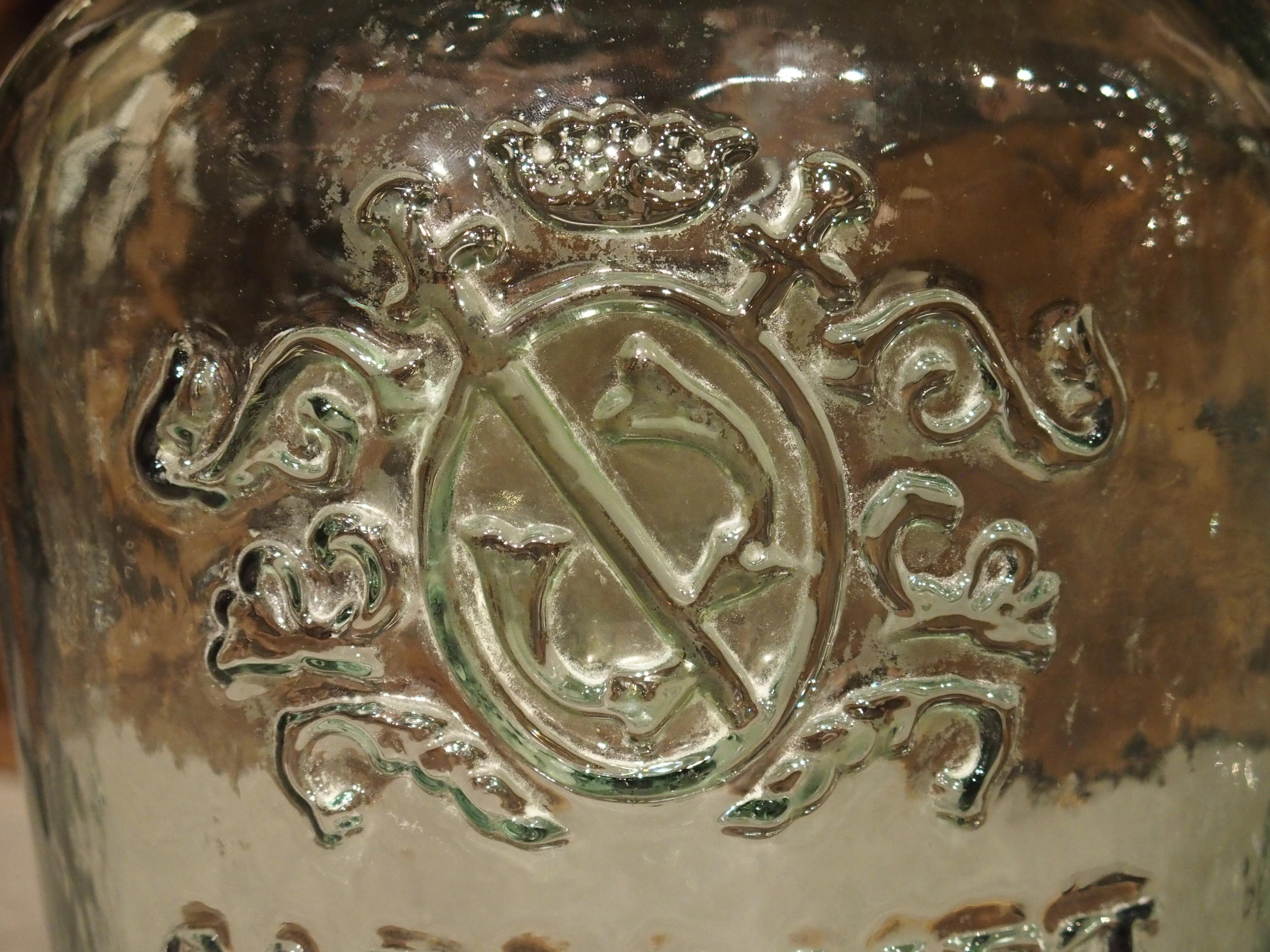 Glass Pair of Decorative Vintage Coat of Arms Demijohn Bottles
