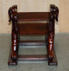 PAIR OF DEEP HARDWOOD LIBRARY STEPS DEPiCTING ORNATELY CARVED DOGS TO THE SIDES
