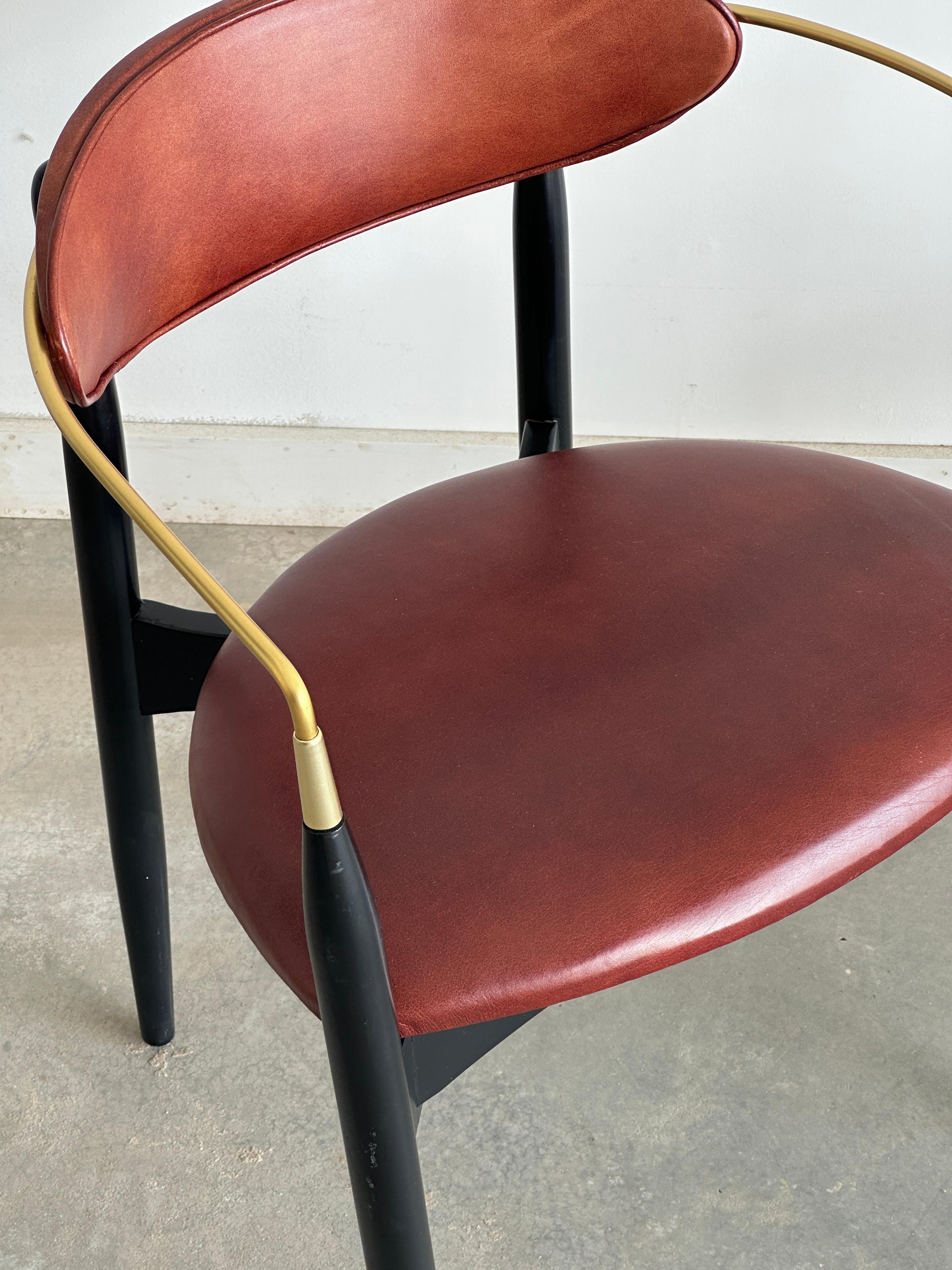 Pair of deep red leather 'Viscount' chairs by Dan Johnson for Selig In Fair Condition For Sale In Kleinburg, ON
