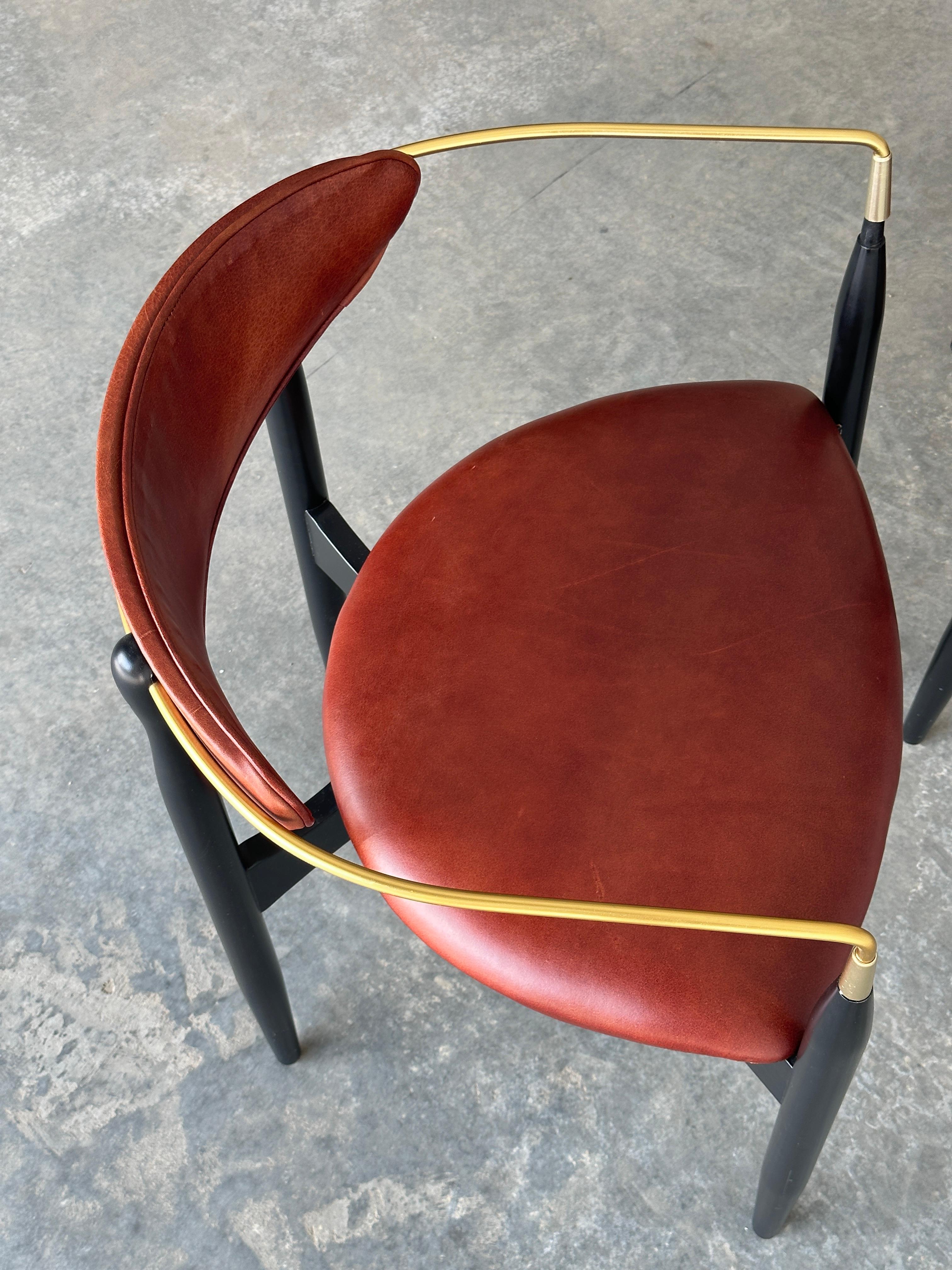 Brass Pair of deep red leather 'Viscount' chairs by Dan Johnson for Selig For Sale